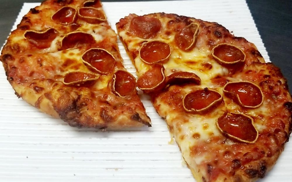 Order Little Sammy Pizza - 4 Pieces food online from Sam's Sorrento Pizza store, Mt Clemens on bringmethat.com