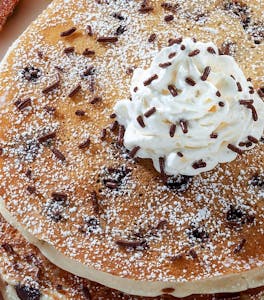 Order Chocolate Chip Pancakes (2) (660 cal) food online from Jimmy Egg store, Oklahoma City on bringmethat.com
