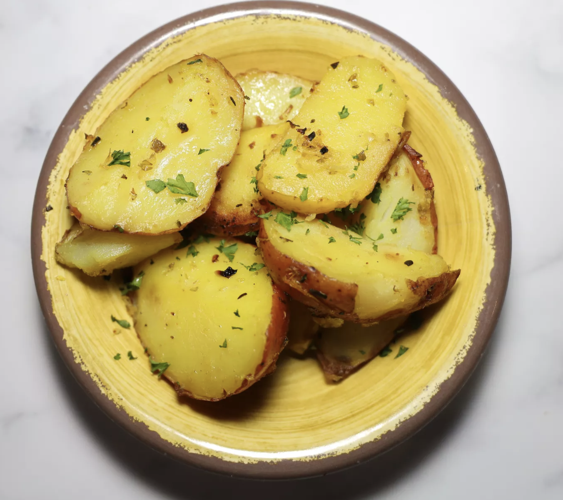 Order Garlic Roasted Potatoes food online from Mazra store, San Bruno on bringmethat.com
