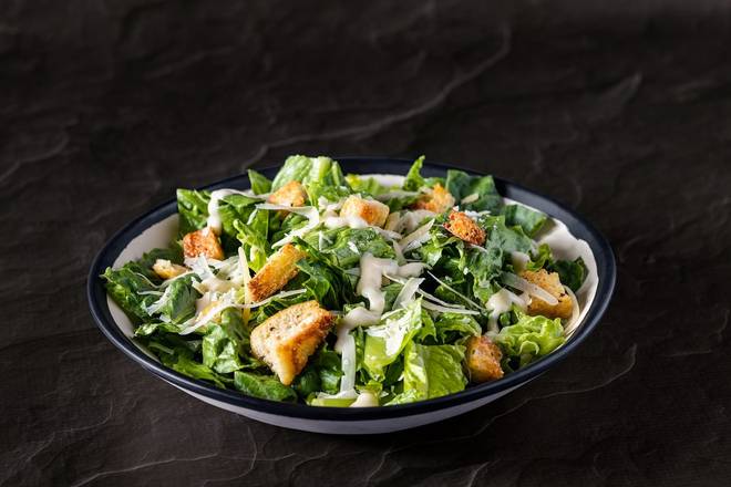 Order Caesar Salad food online from Brixx Wood Fired Pizza store, Charlotte on bringmethat.com