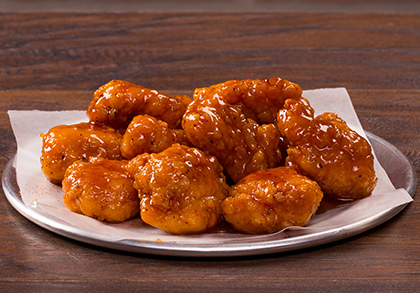 Order Boneless Stingin Honey Garlic Wings food online from Mountain Mikes Pizza store, Fairfield on bringmethat.com