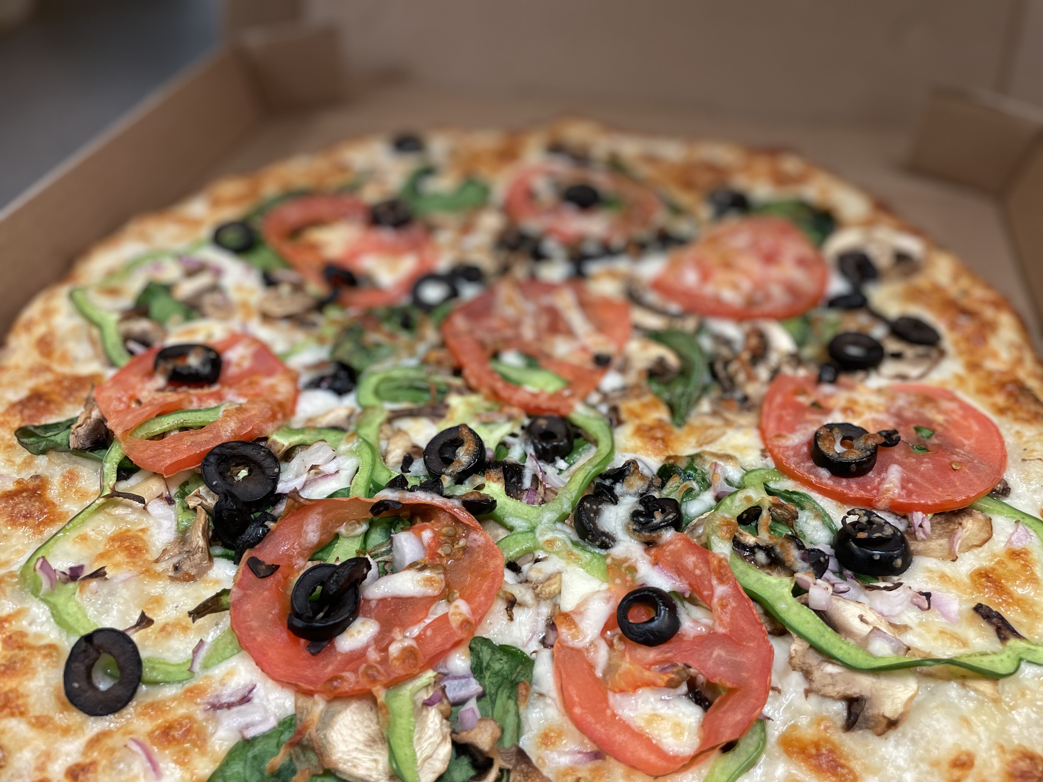 Order Veggie Delight Pizza food online from Blazzin Pizza store, Vancouver on bringmethat.com