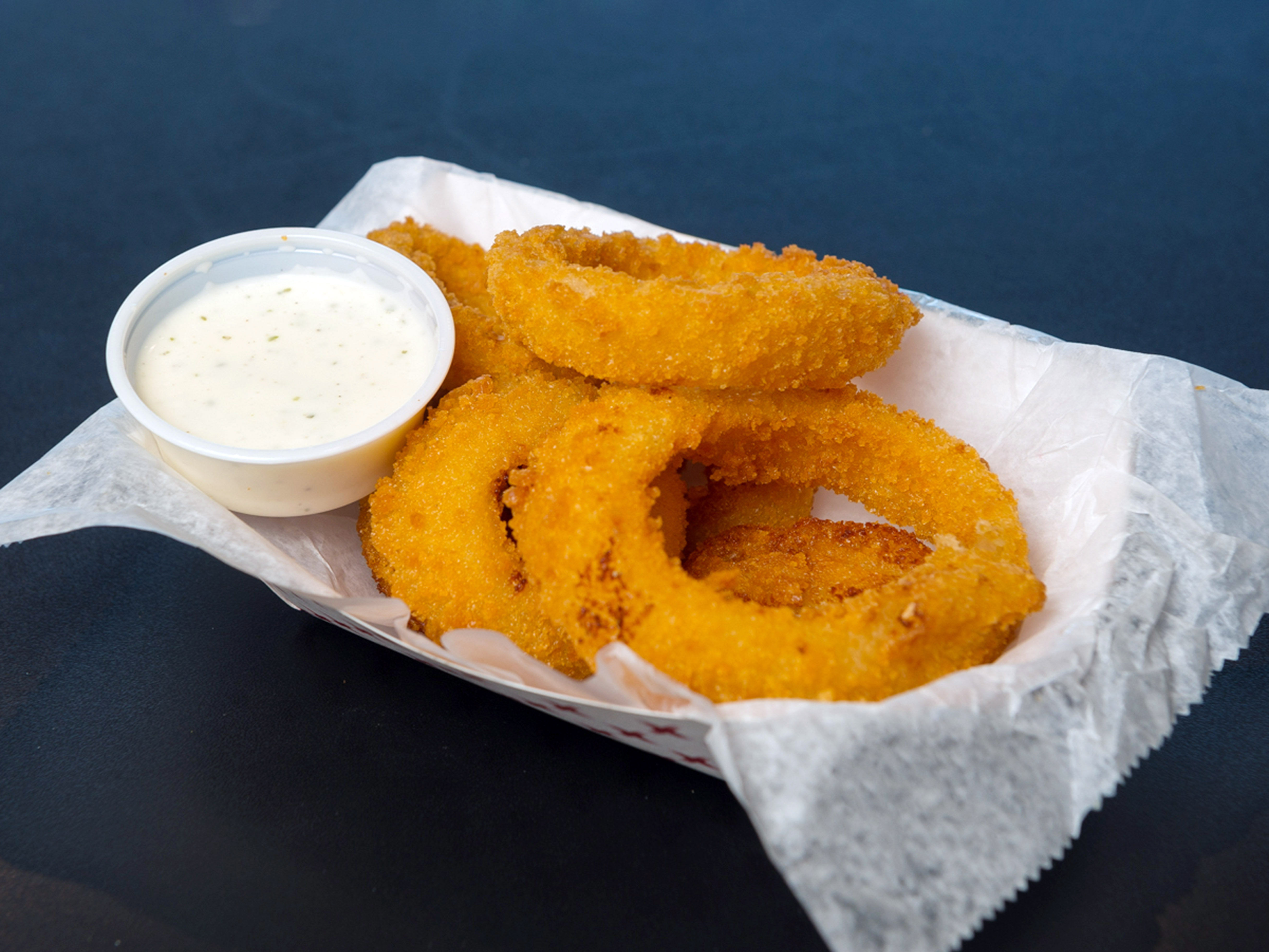 Order Gourmet Onion Rings food online from Philly Grill store, Waterbury on bringmethat.com