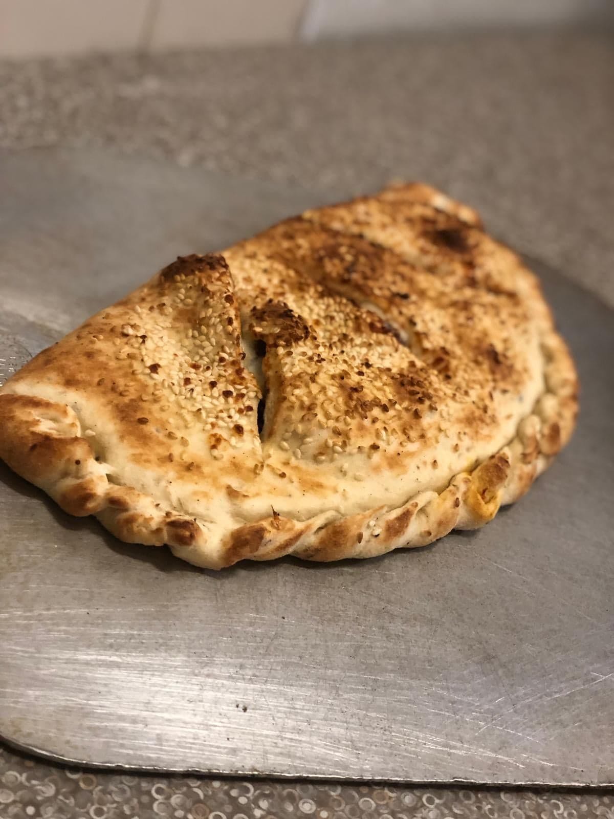 Order Buffalo Chicken Calzone - Calzone food online from Antelope Market store, Antelope on bringmethat.com
