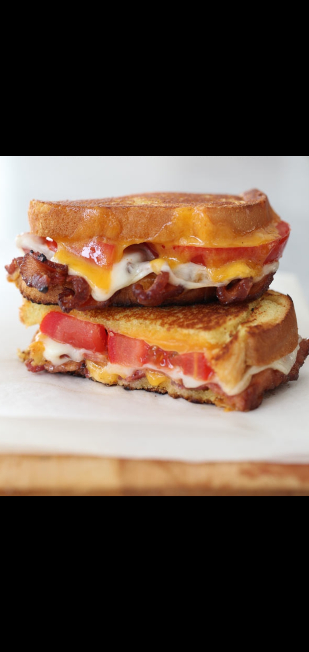 Order Grilled Cheese With Tomatoes & Bacon  food online from American Gourmet Foods Deli store, New York on bringmethat.com