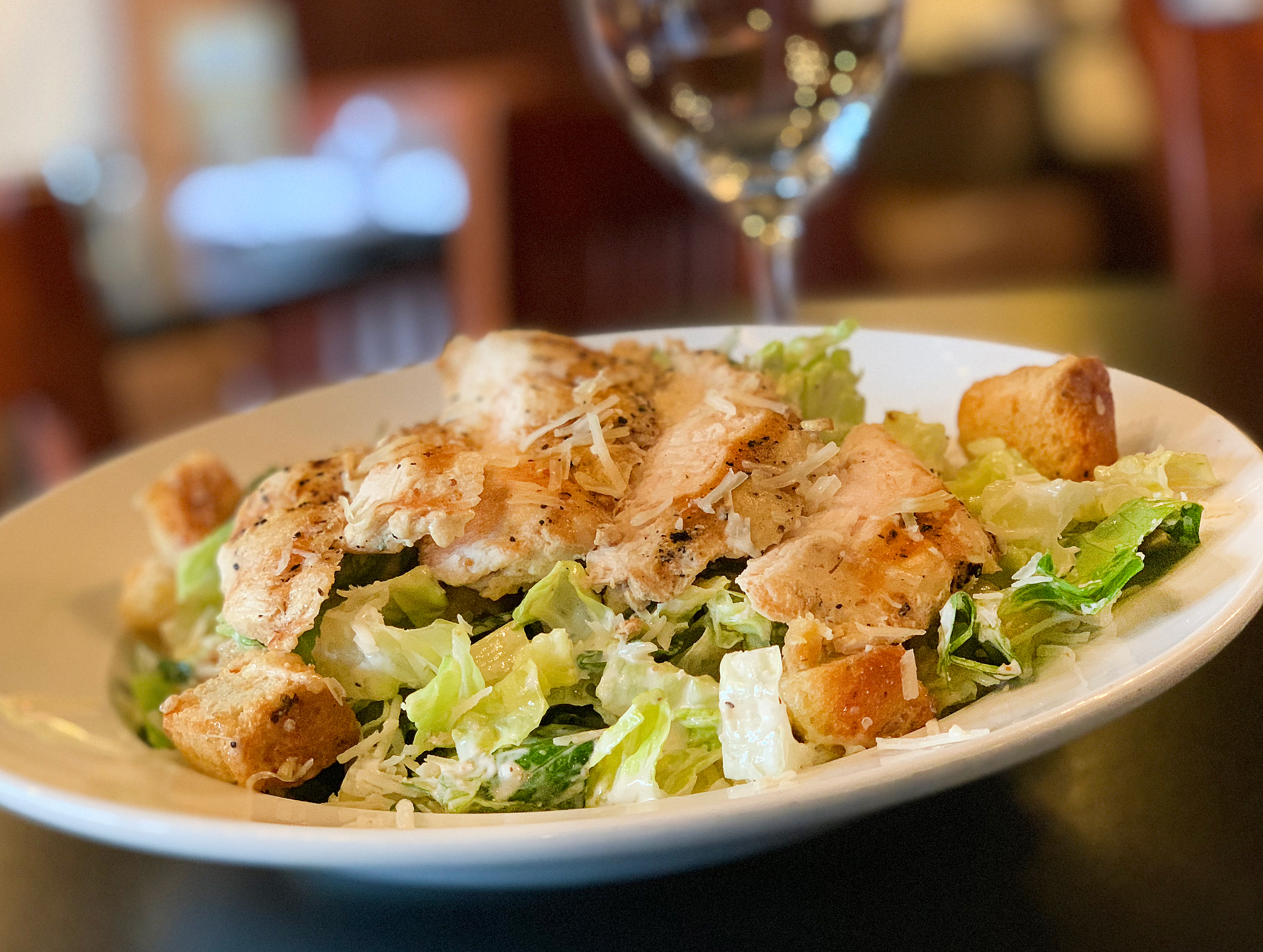 Order Caesar Salad food online from Taxi Grille & Bar store, Omaha on bringmethat.com