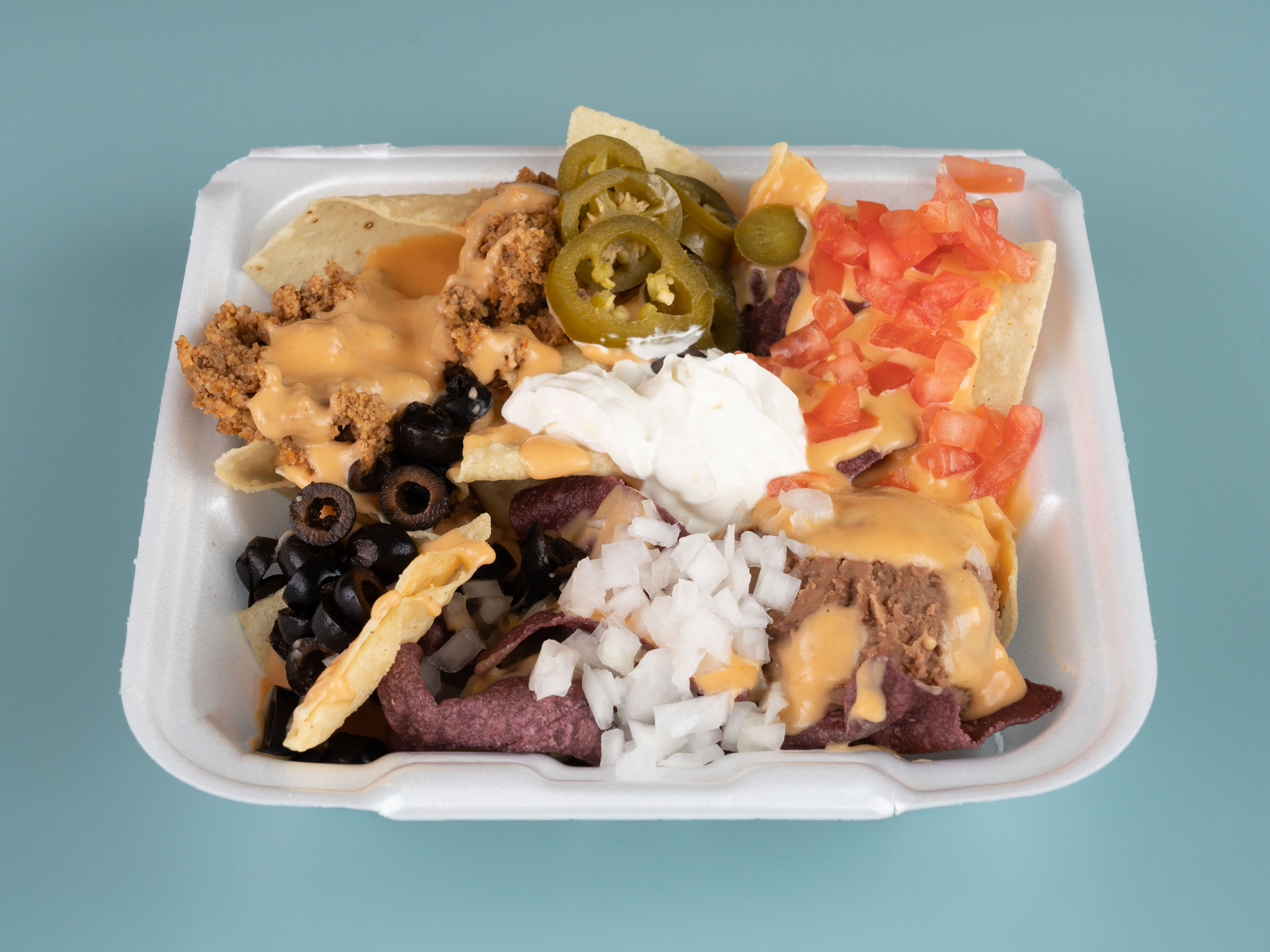 Order Deluxe Nacho Platter food online from Pepe's Mexican Cafe store, Bryan on bringmethat.com