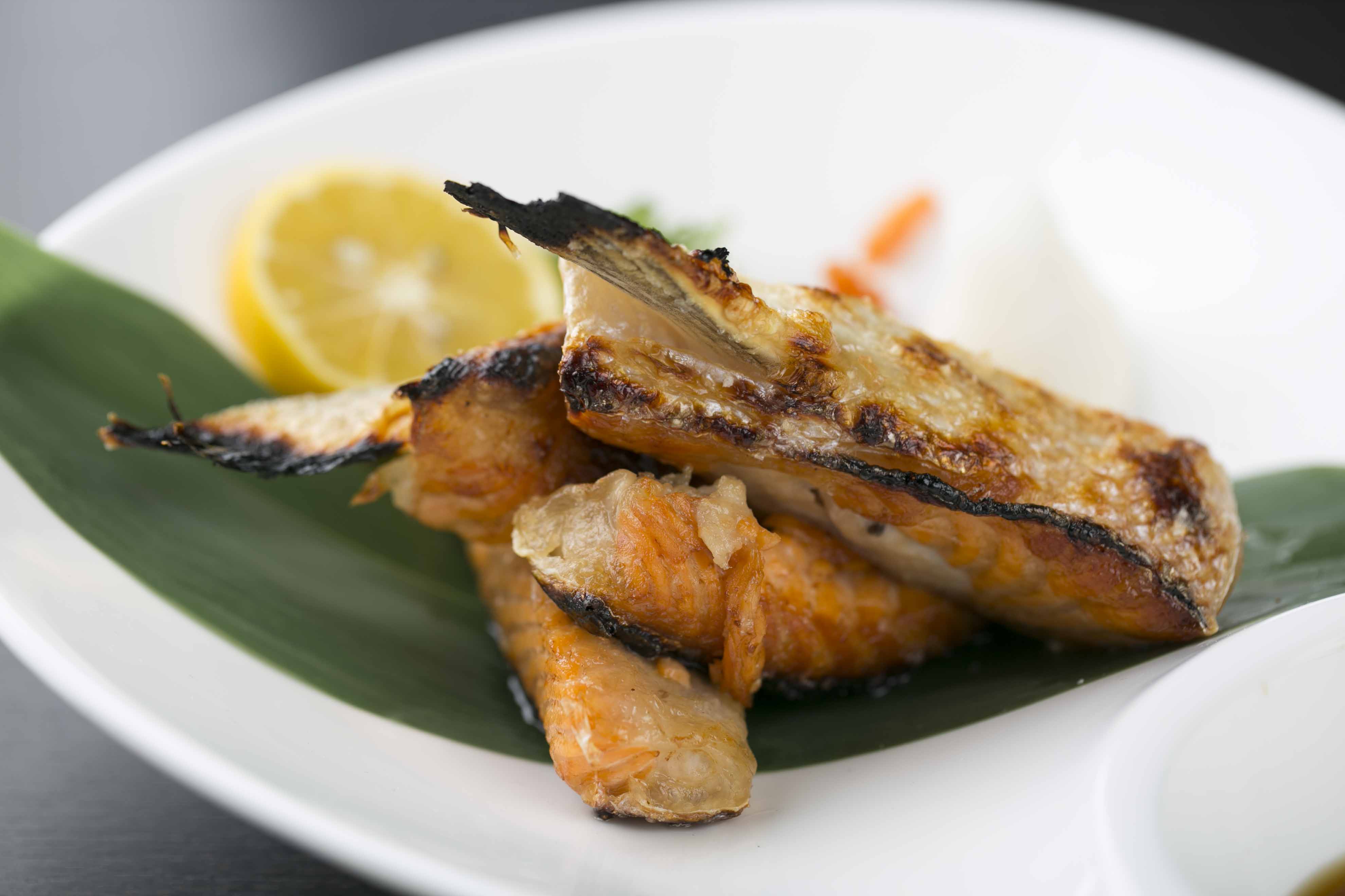 Order I12. Grilled Salmon Belly food online from Icho Izakaya Fusion Cuisine store, Temple City on bringmethat.com