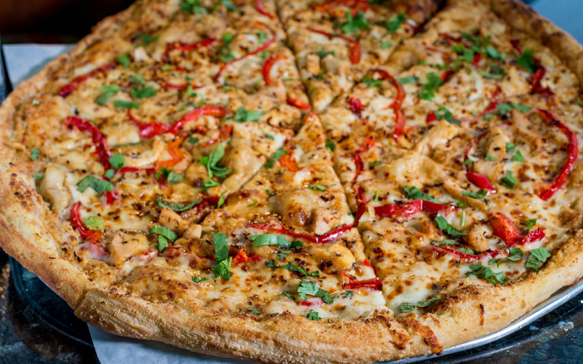 Order Spicy Thai Pizza - Medium 12'' food online from Schmizza Pub & Grub store, Beaverton on bringmethat.com