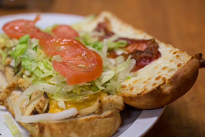 Order Chicken Bacon Club Grinder - Half 9" food online from Mancino's Pizza & Grinders store, Holland on bringmethat.com