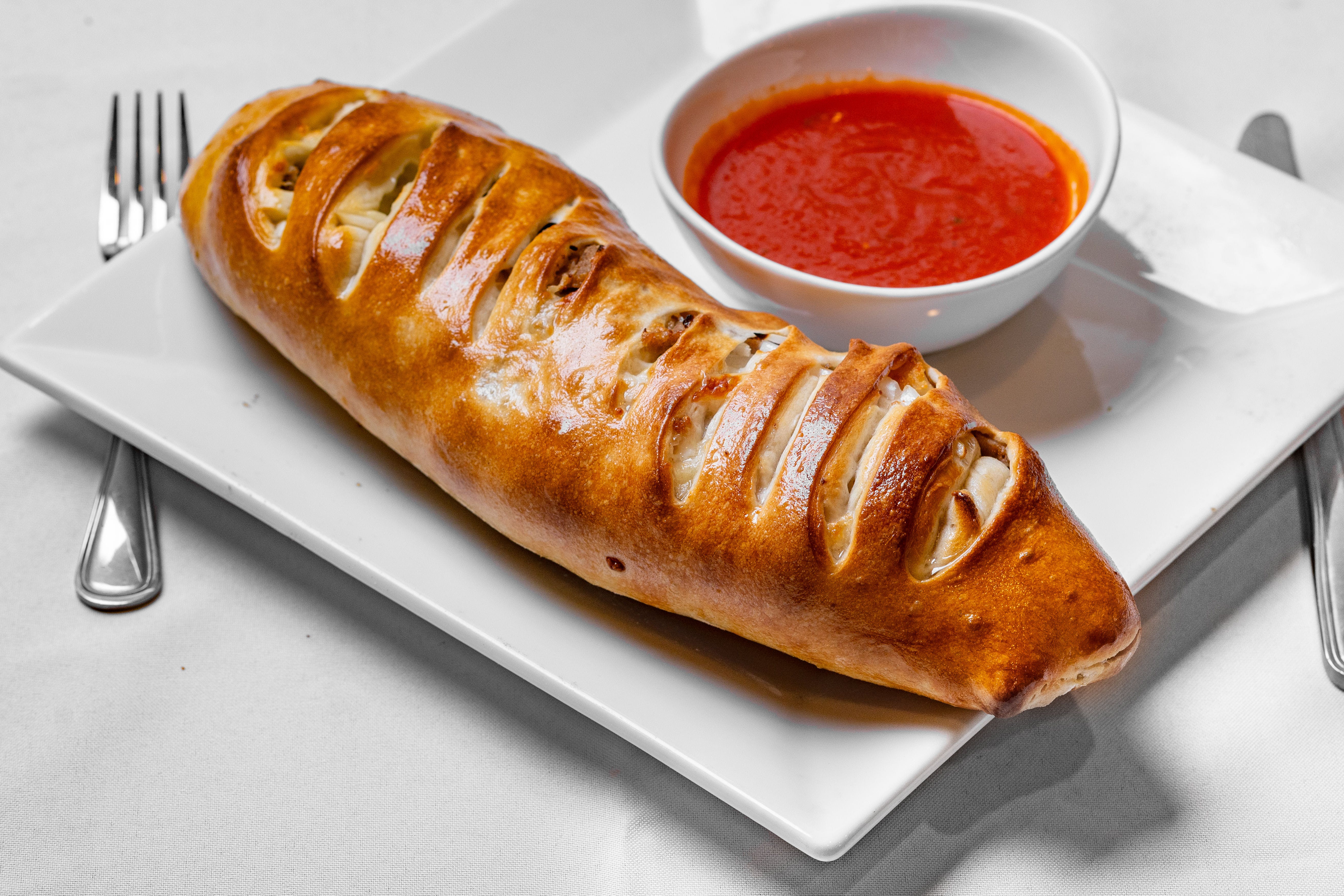 Order Stromboli Classico - Calzone food online from Angelina Trattoria store, Florham Park on bringmethat.com
