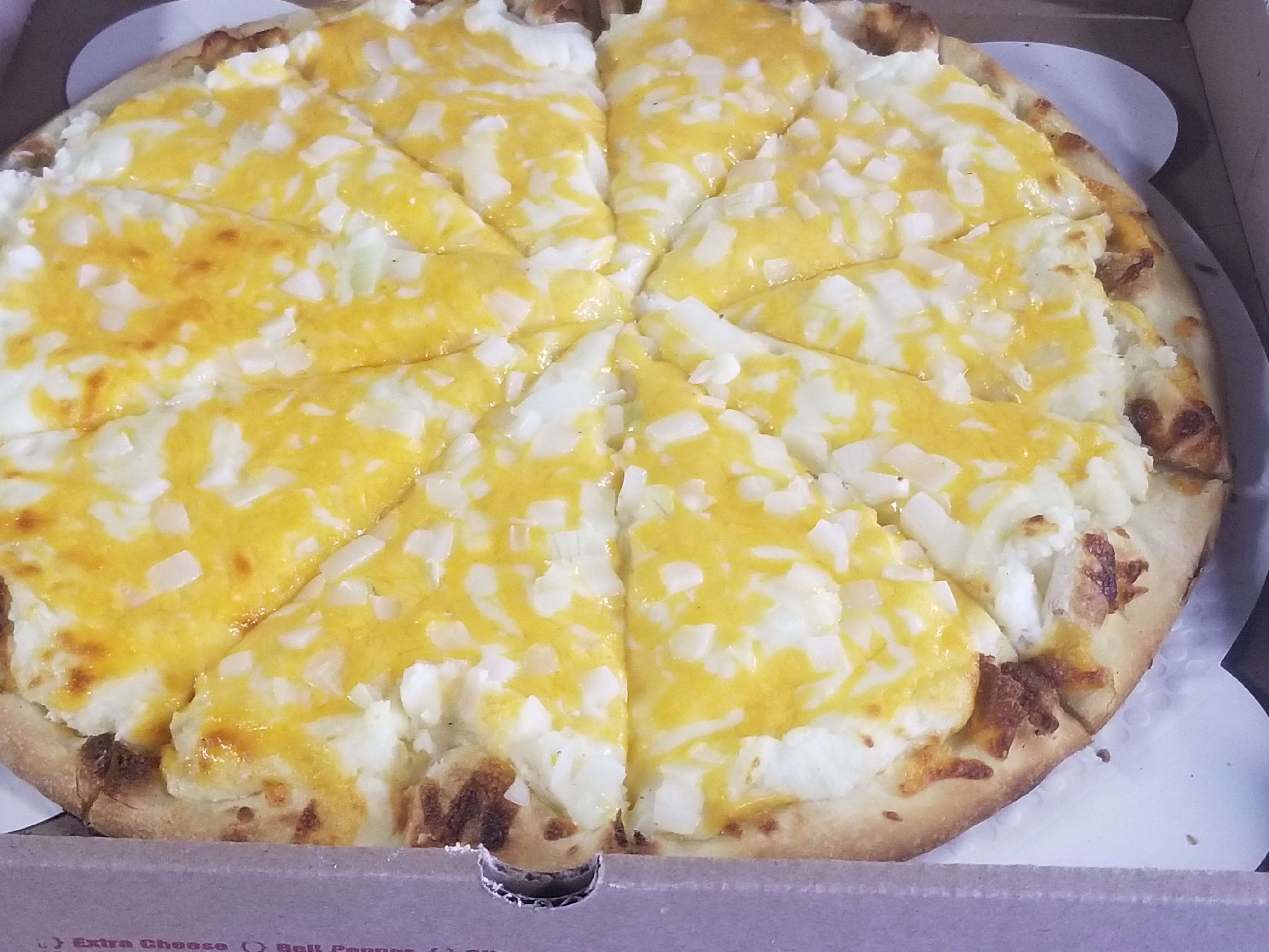 Order Perogie Pizza - Small 10" (4 Cut) food online from Novotny's Groceries & Pizza store, Worthington on bringmethat.com