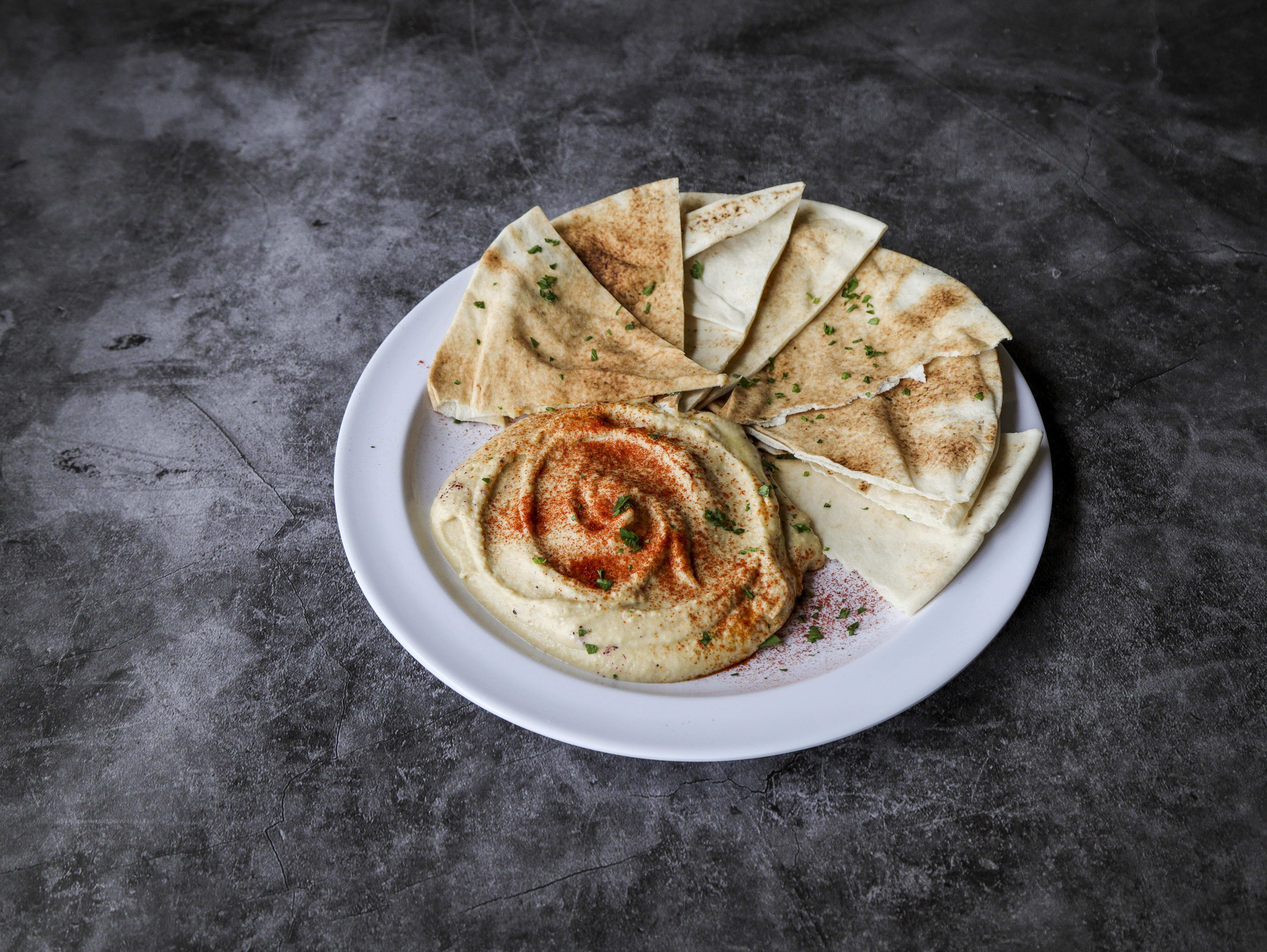 Order Hummus food online from People's Bakery store, Madison on bringmethat.com