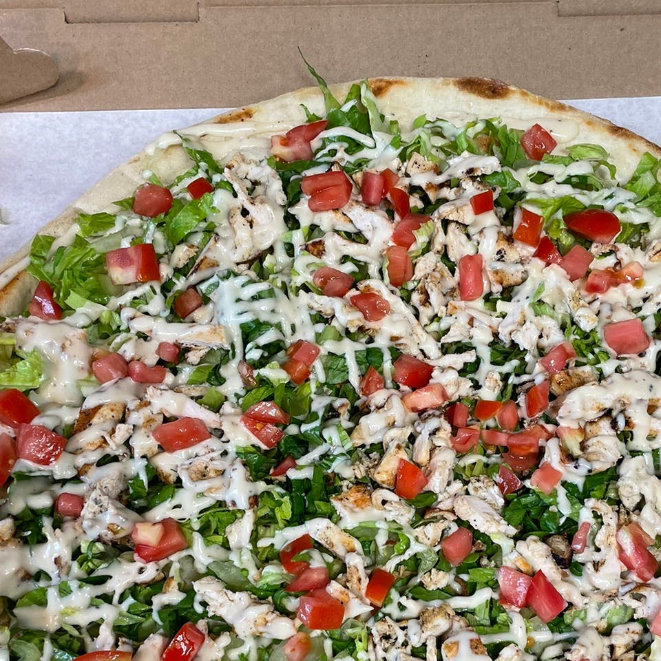 Order Personal Grilled Chicken Caesar Salad Pizza - Personal food online from Davila's Pizza & Restaurant store, Hackettstown on bringmethat.com