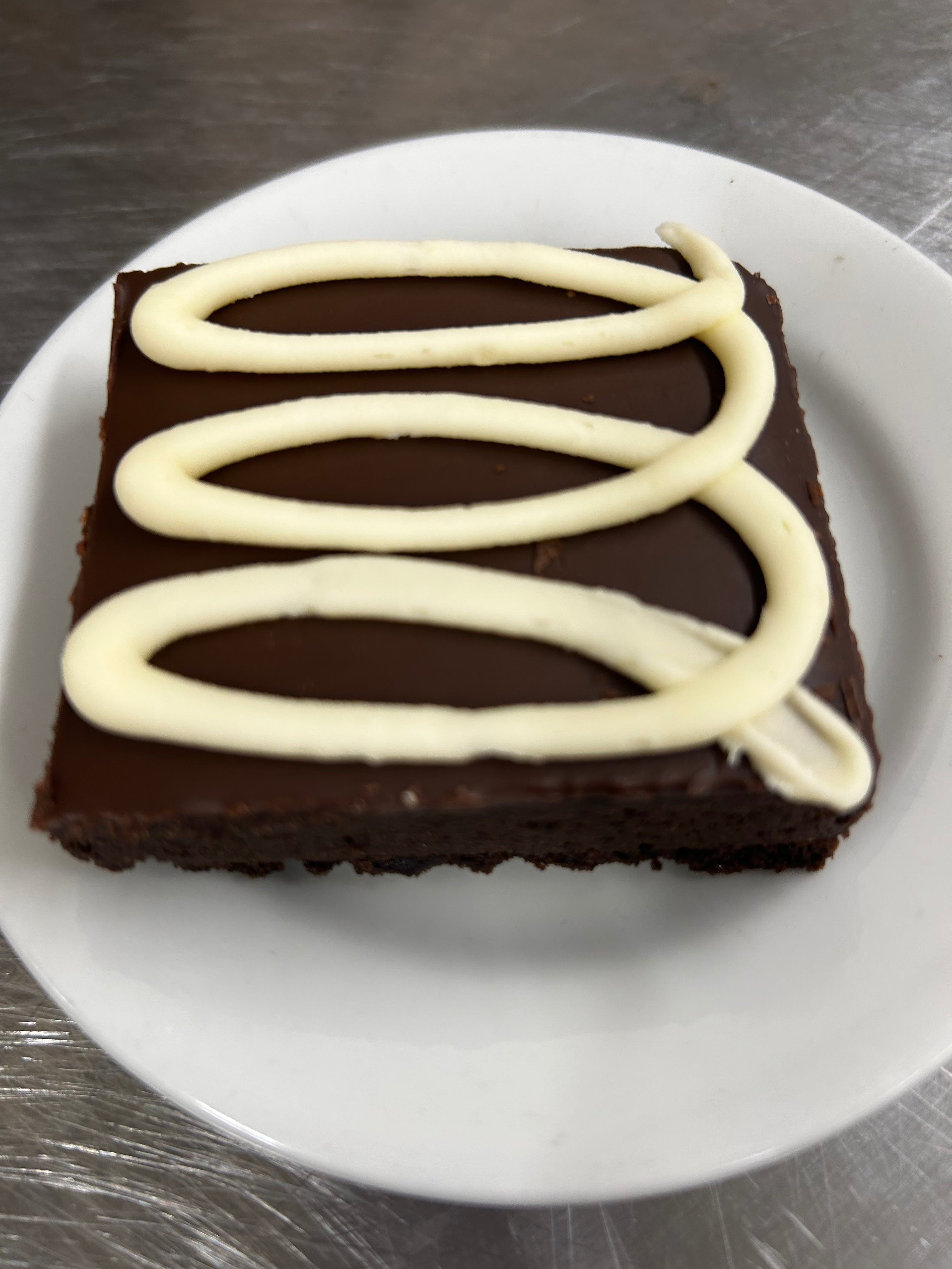 Order Vanilla iced Brownie - Slice food online from Sophia Italian Restaurant & Pizzeria store, Reading on bringmethat.com