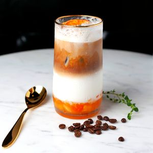 Order Orange Caffe Latte (Iced Only) food online from Mealtop store, Los Angeles on bringmethat.com
