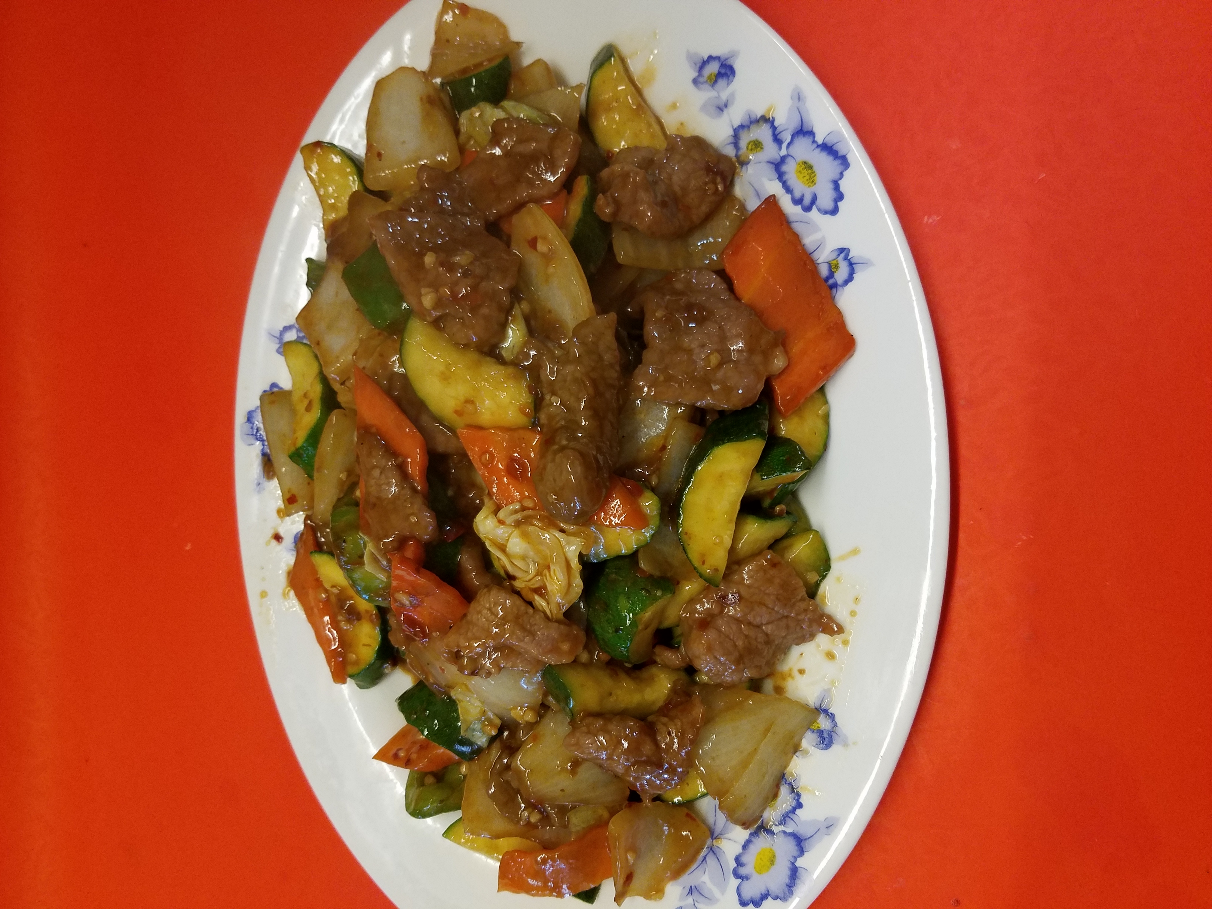 Order Hunan Beef food online from New Bamboo Kitchen store, Alameda on bringmethat.com