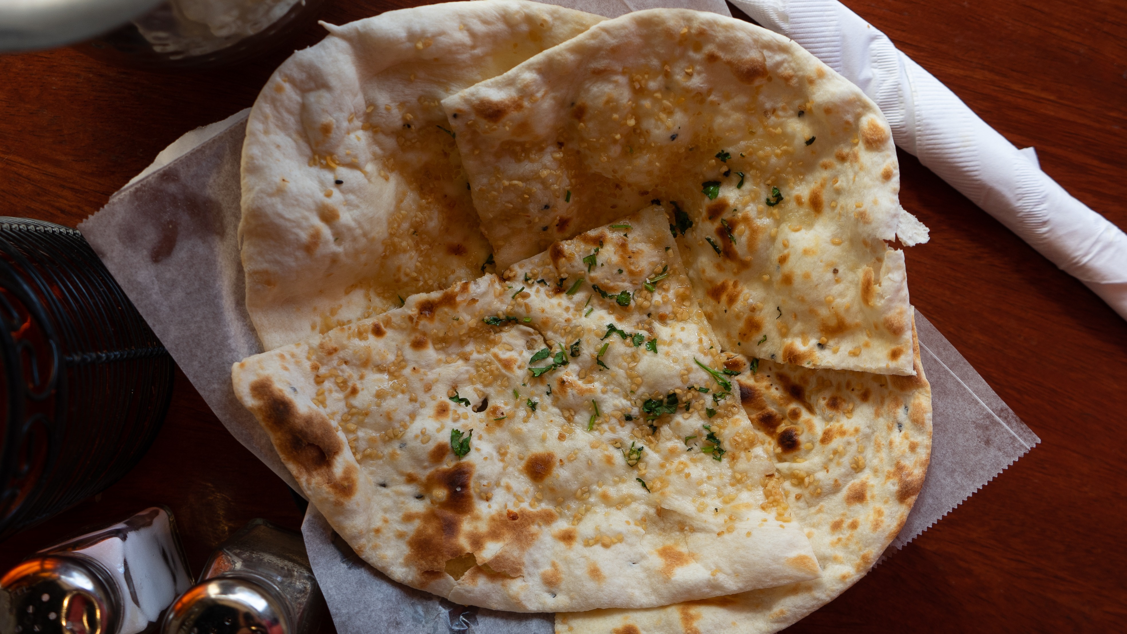 Order Garlic Naan food online from Little India Restaurant store, Lakewood on bringmethat.com