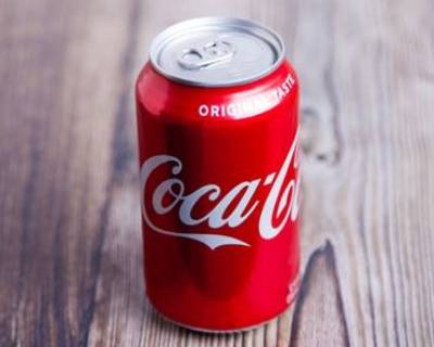 Order Coke Can food online from Salad Kreation store, Raleigh on bringmethat.com