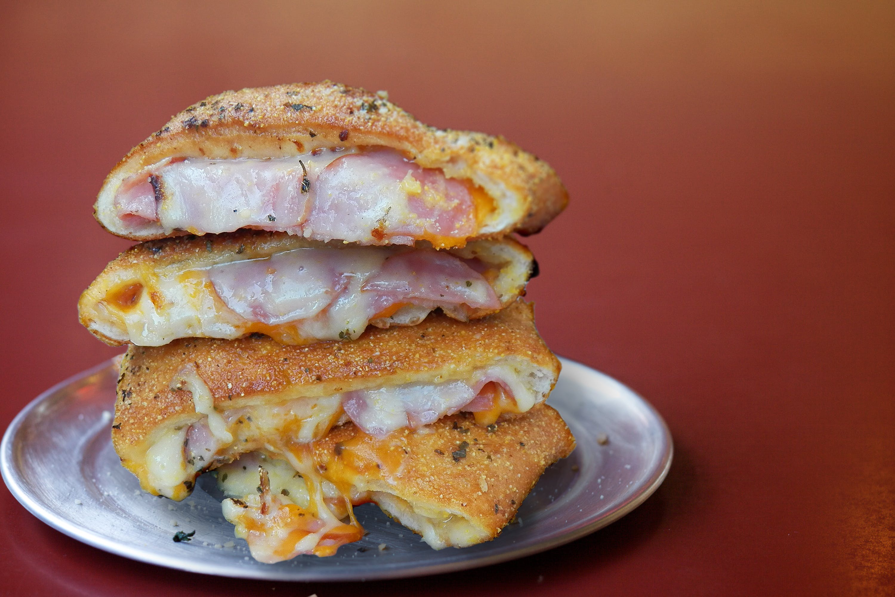 Order Ham & Cheese Stromboli - Medium food online from DoubleDave's Pizzaworks store, Houston on bringmethat.com