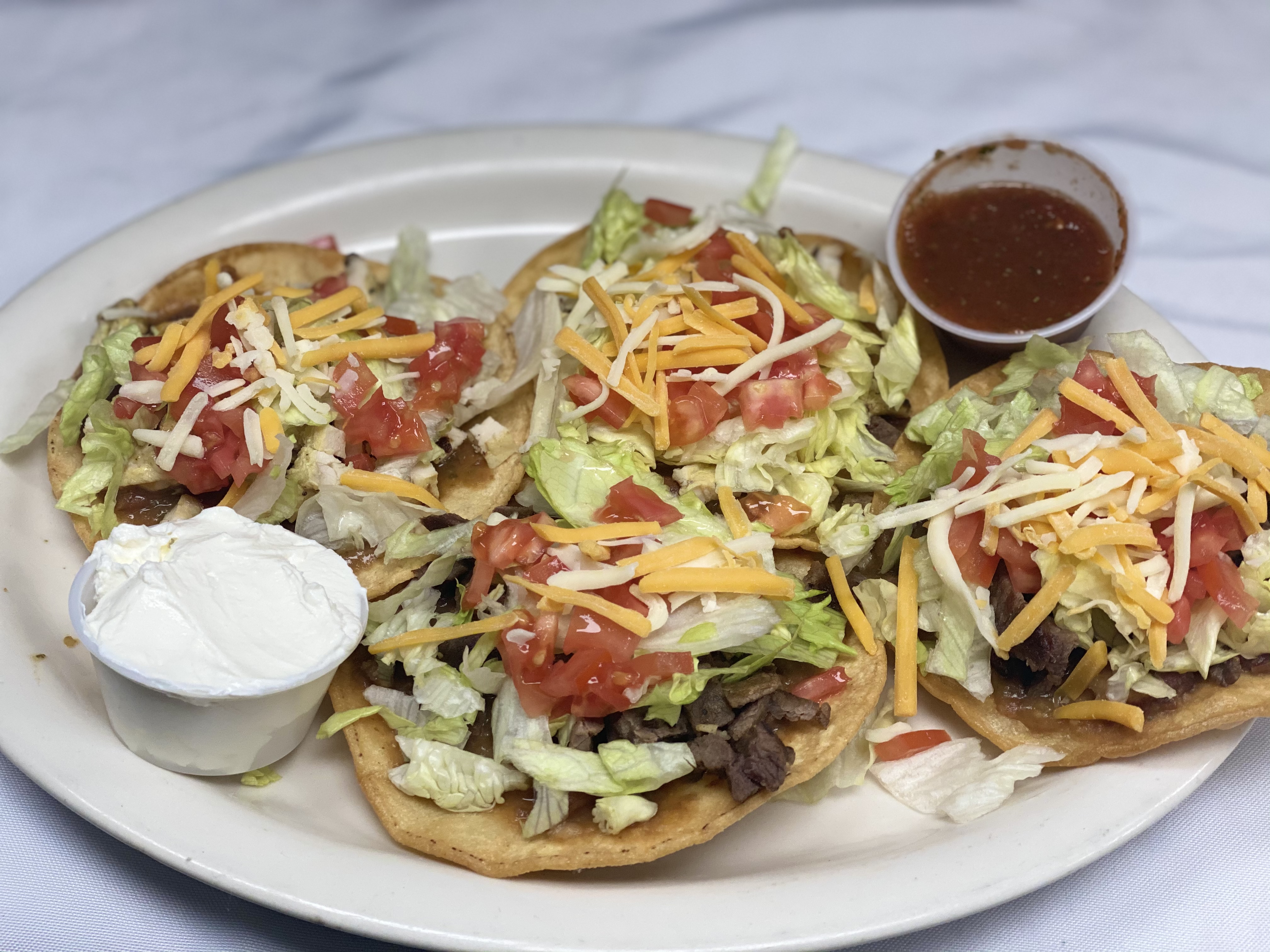 Order Tostadas food online from Papa Latin Cuisine store, West Haverstraw on bringmethat.com