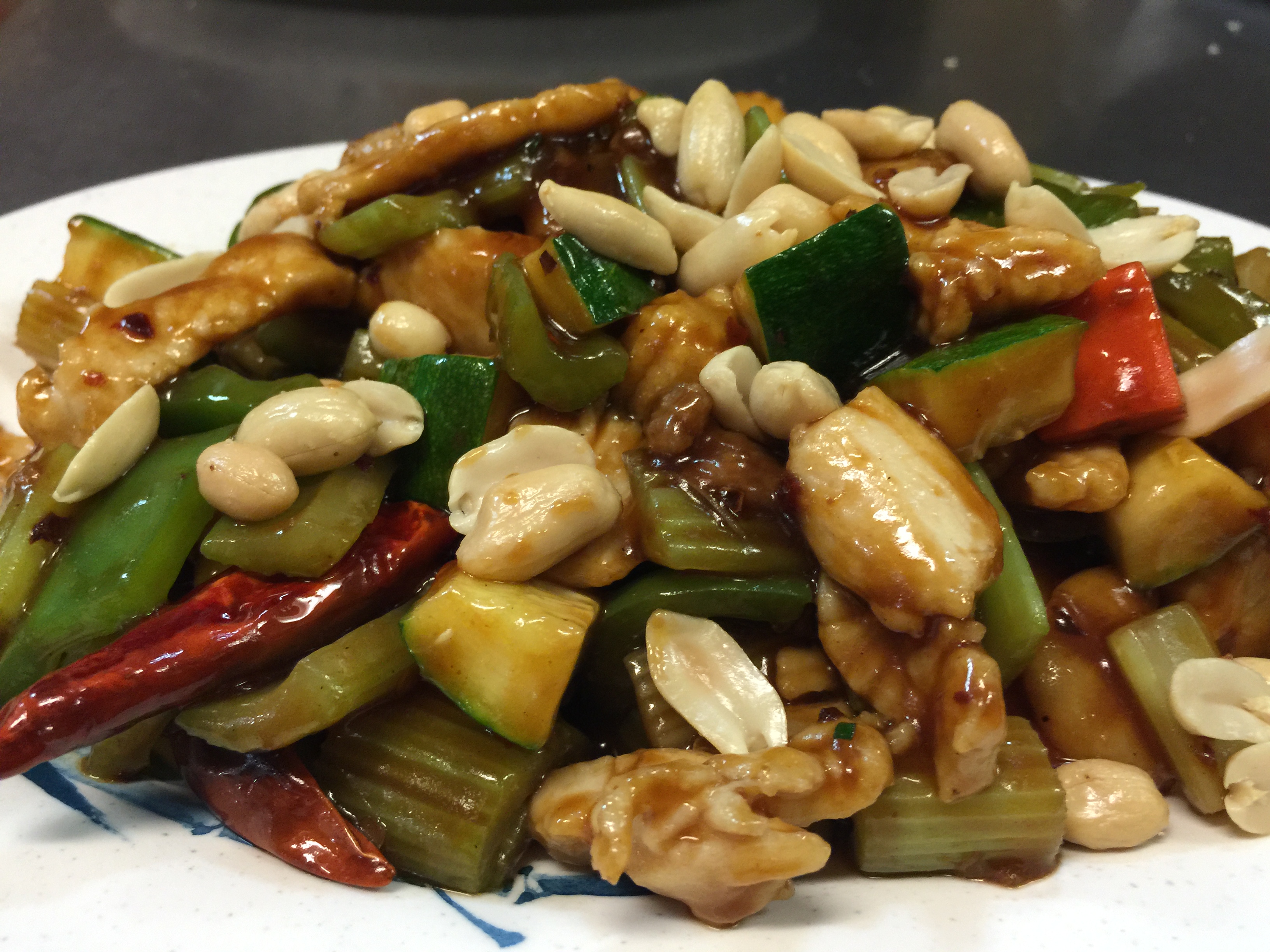 Order 42. Kung Pao Chicken food online from Tsing Tao Chinese Cuisine store, Mesa on bringmethat.com