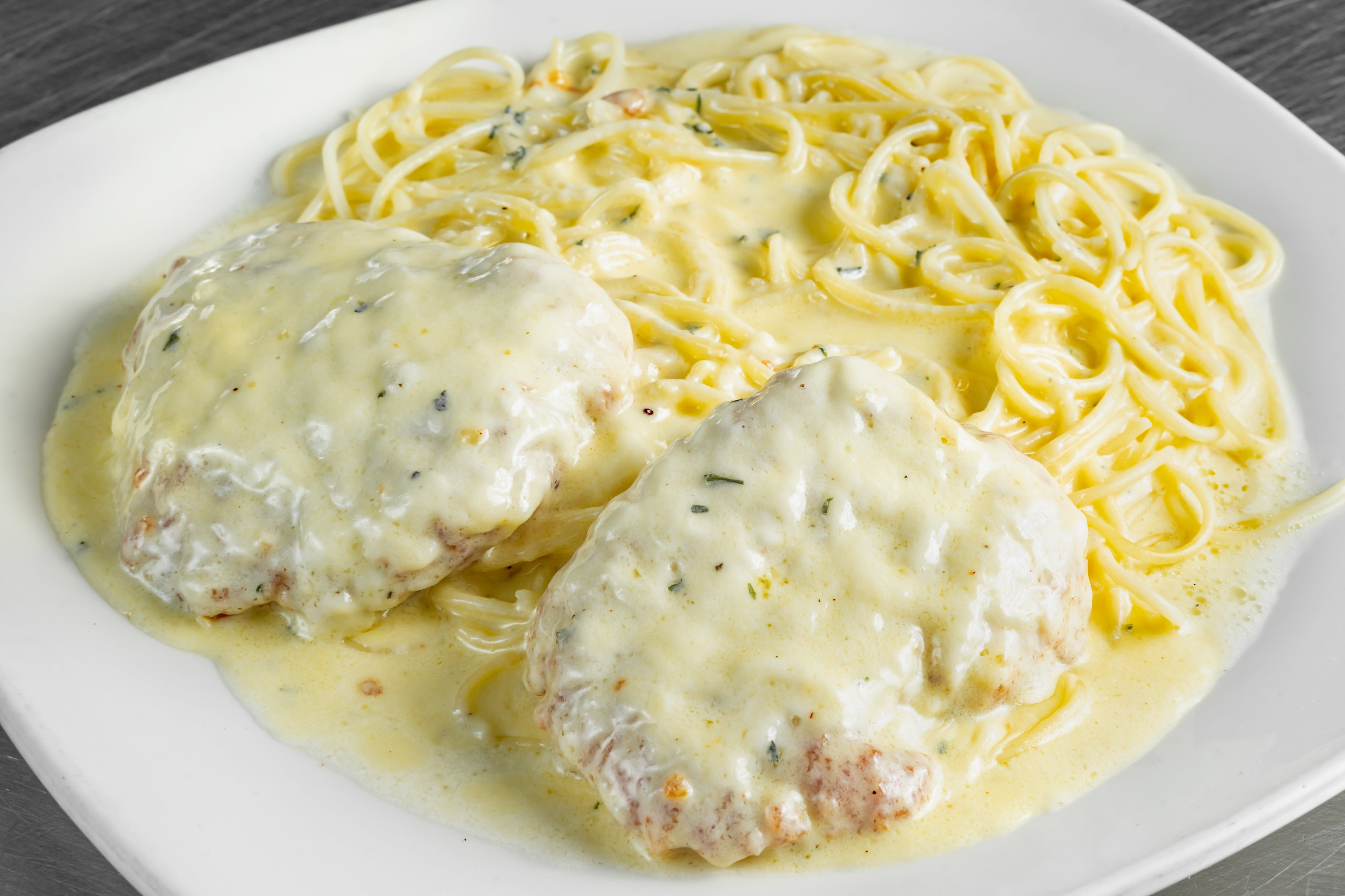 Order Chicken Parm Cremera - Entree food online from Joe's Pizza Pasta & Subs store, Justin on bringmethat.com