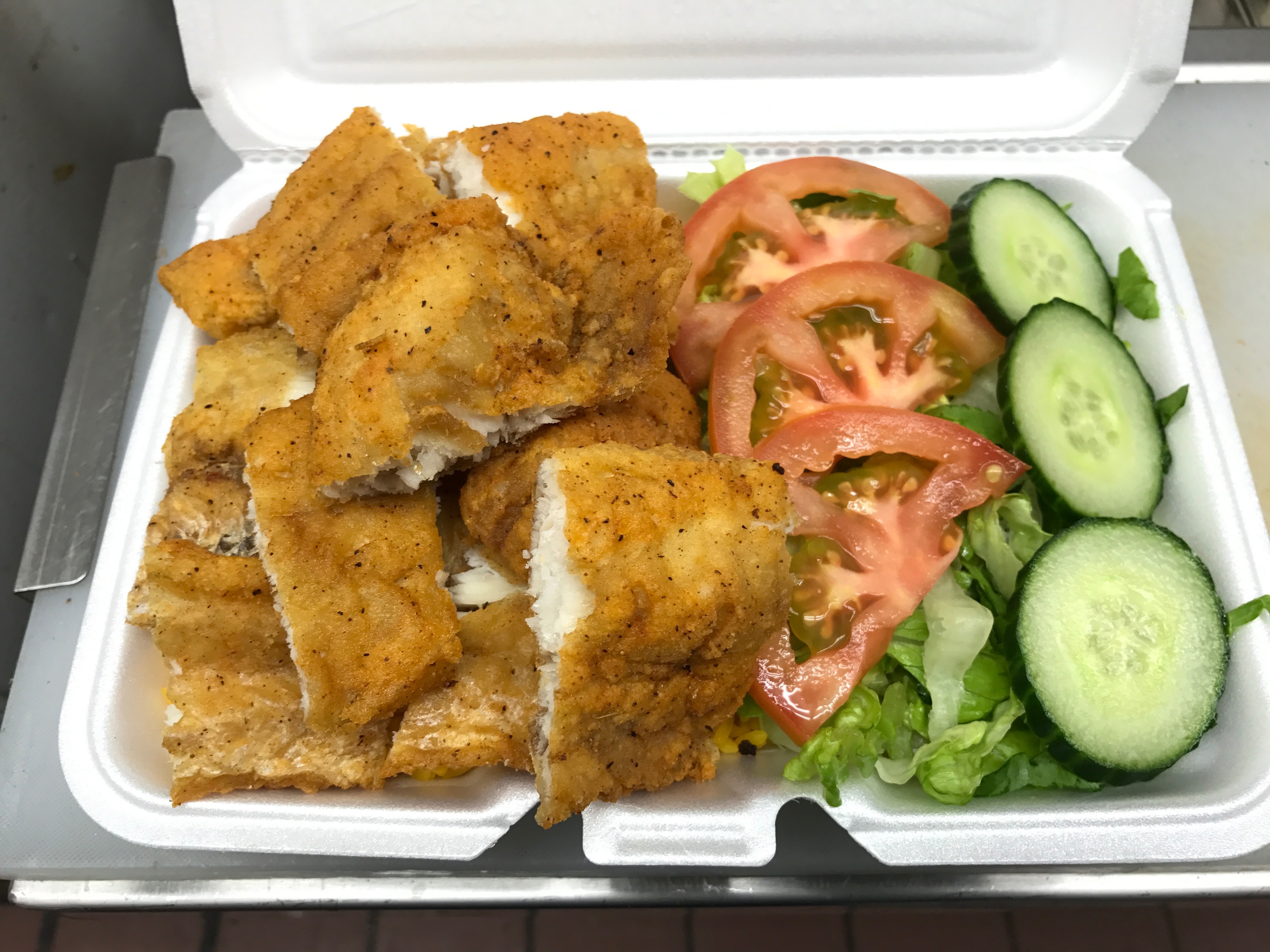 Order Talapia Over Rice food online from Crown Fried Chicken store, Philadelphia on bringmethat.com