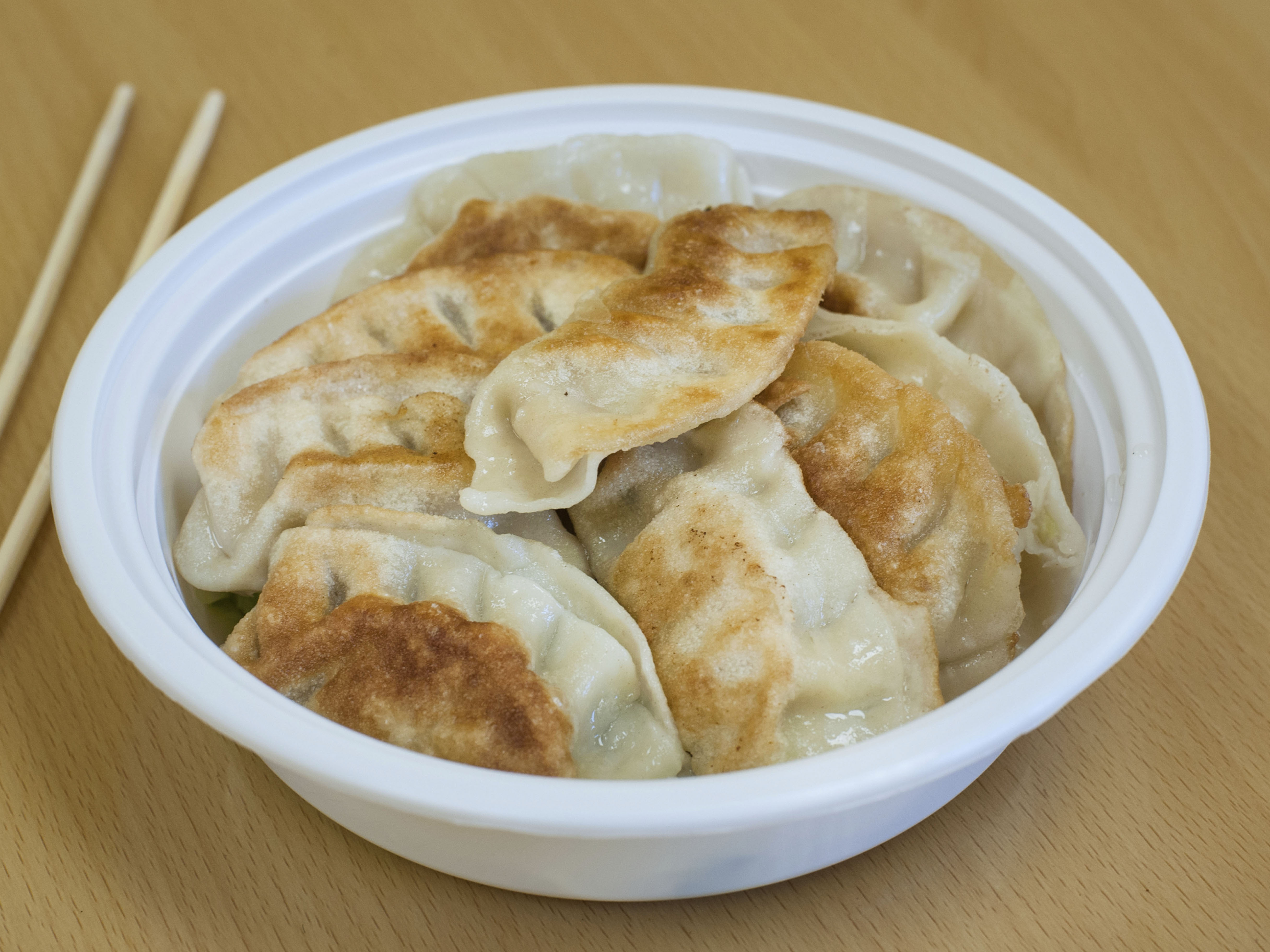 Order 104.  (6) Pieces Pot Stickers food online from China China store, Joliet on bringmethat.com