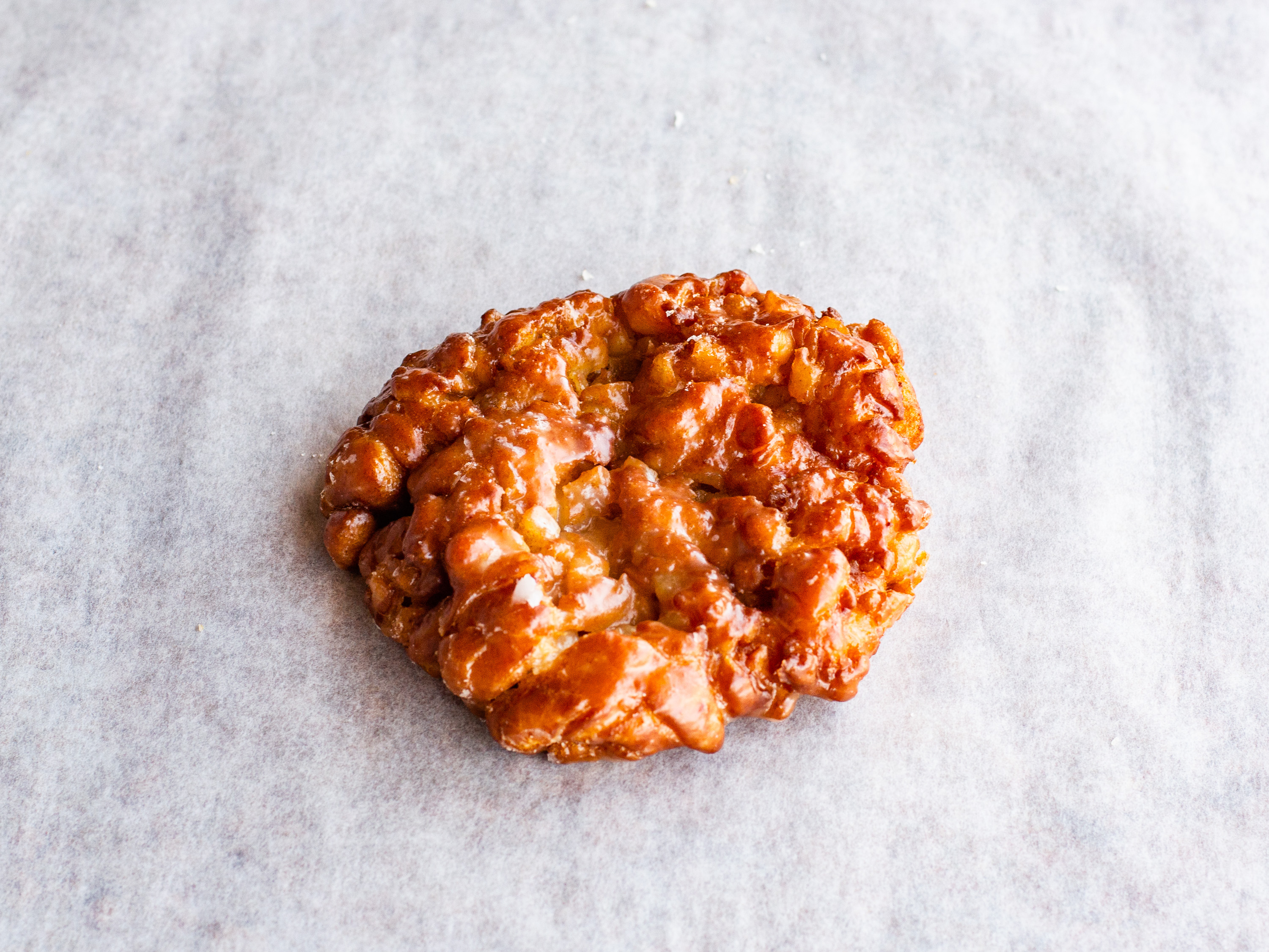 Order Apple Fritter food online from Donuts To Go store, Reedley on bringmethat.com