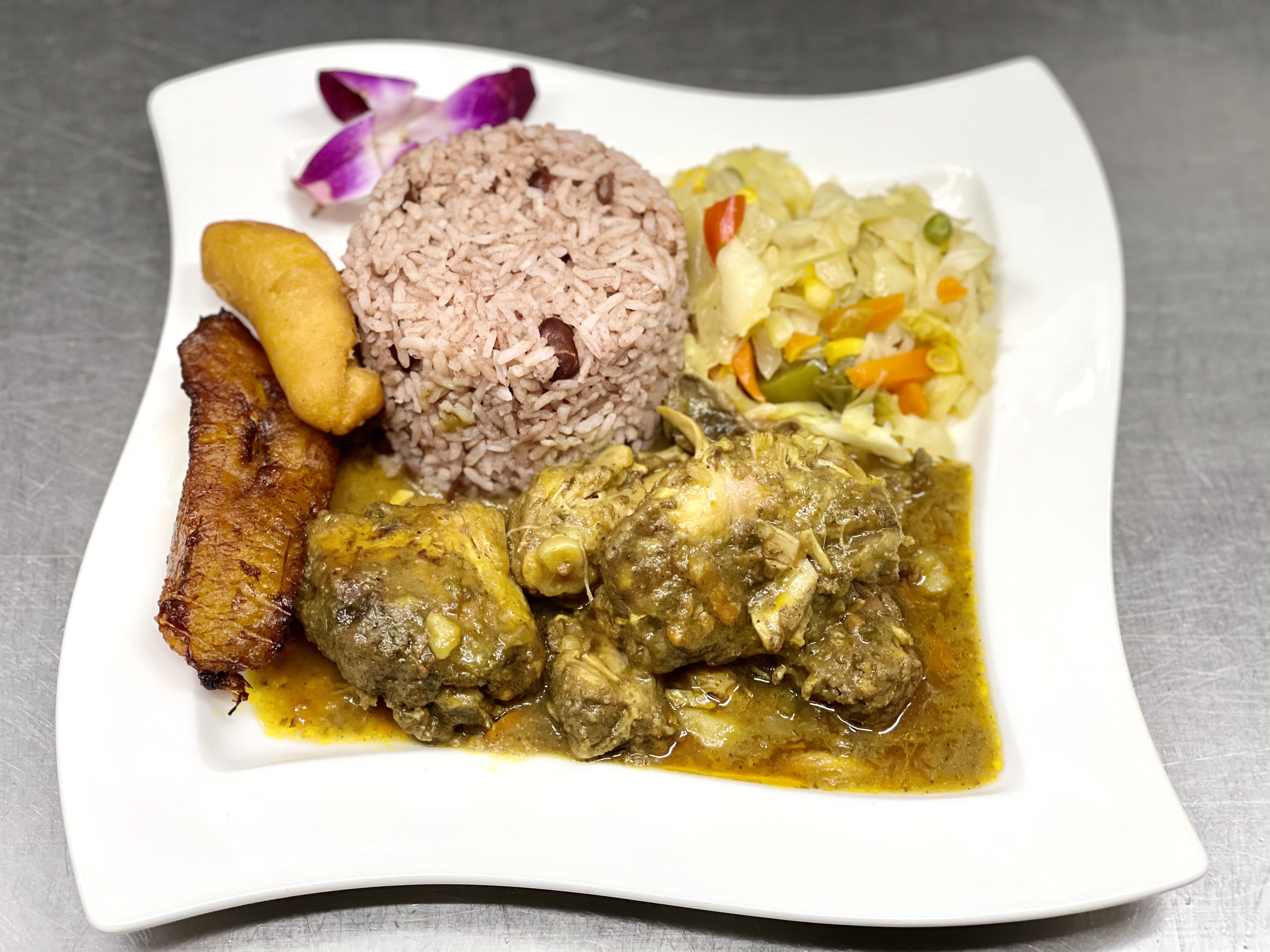 Order Curry Chicken food online from One876 Caribbean Restaurant store, Chatsworth on bringmethat.com