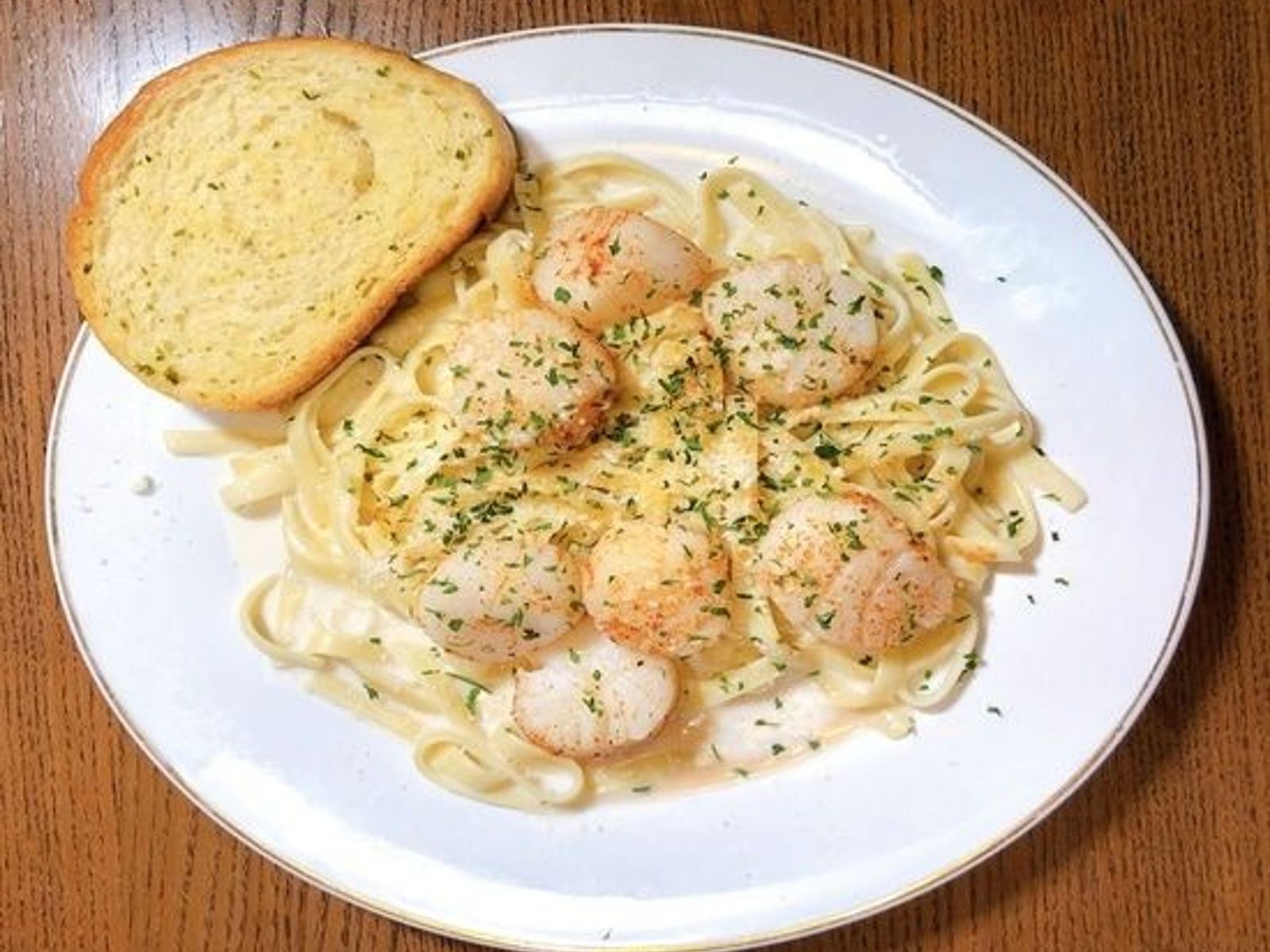 Order Scallop Pasta food online from Juicy Seafood store, Clarksville on bringmethat.com