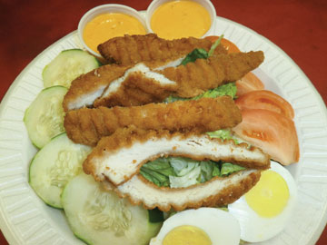 Order Tossed Salad with Crispy Chicken food online from Tharsy Grill store, Baltimore on bringmethat.com