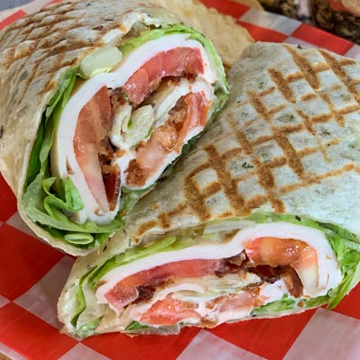 Order Turkey BLT Wrap food online from Cafe Peanut store, Jersey City on bringmethat.com