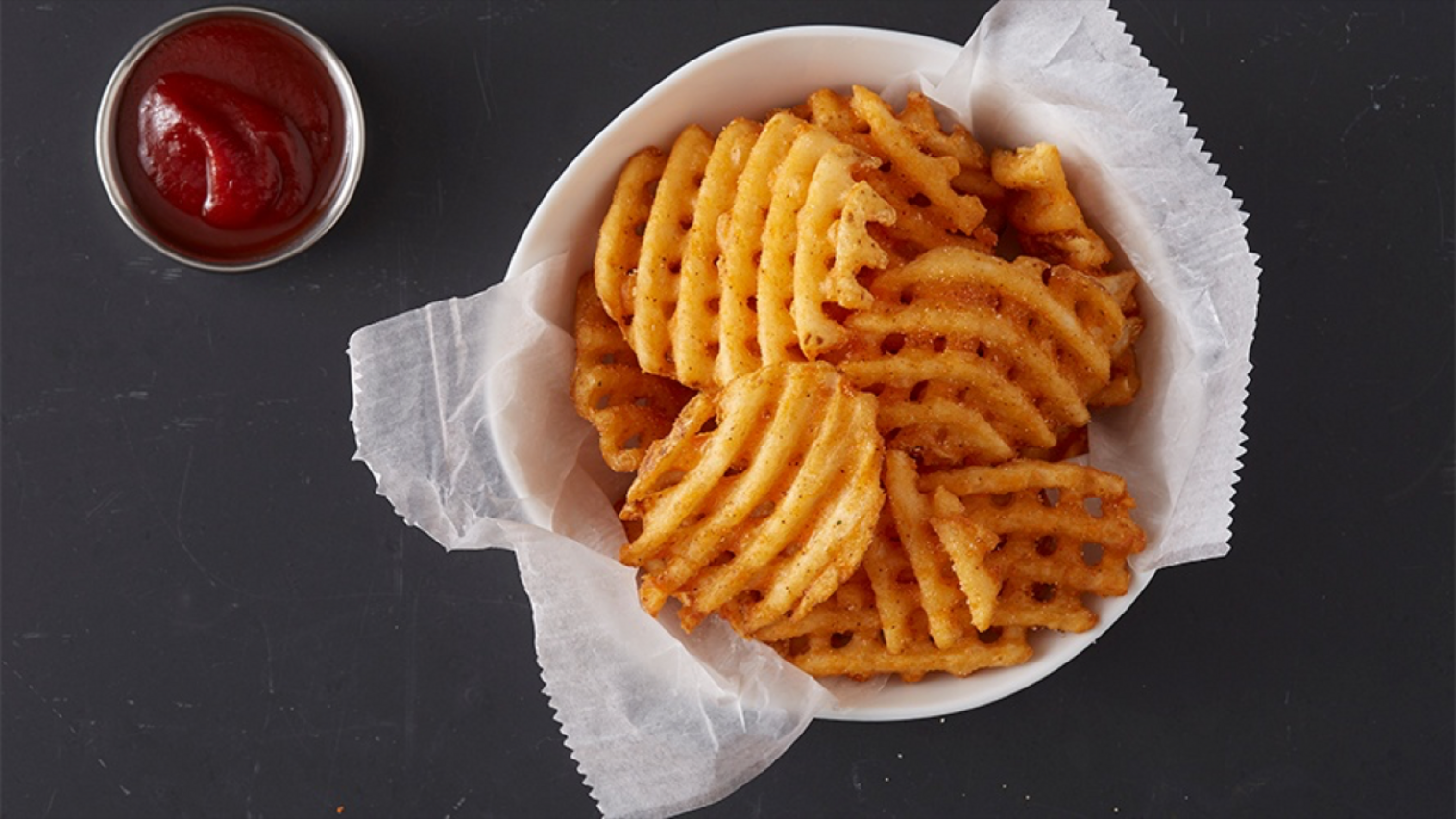 Order Waffle Fries food online from Saucy Tenders store, Athens on bringmethat.com