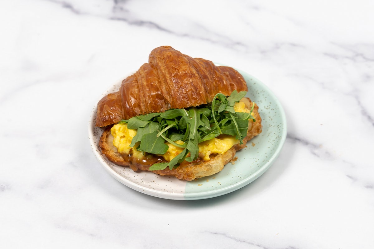 Order Egg & Cheese w/ Greens Croissant food online from Bluestone Lane store, Los Angeles on bringmethat.com