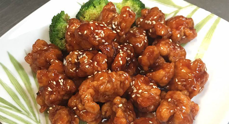 Order 110. Sesame Chicken food online from Royal Buffet Sushi Grill store, Youngstown on bringmethat.com