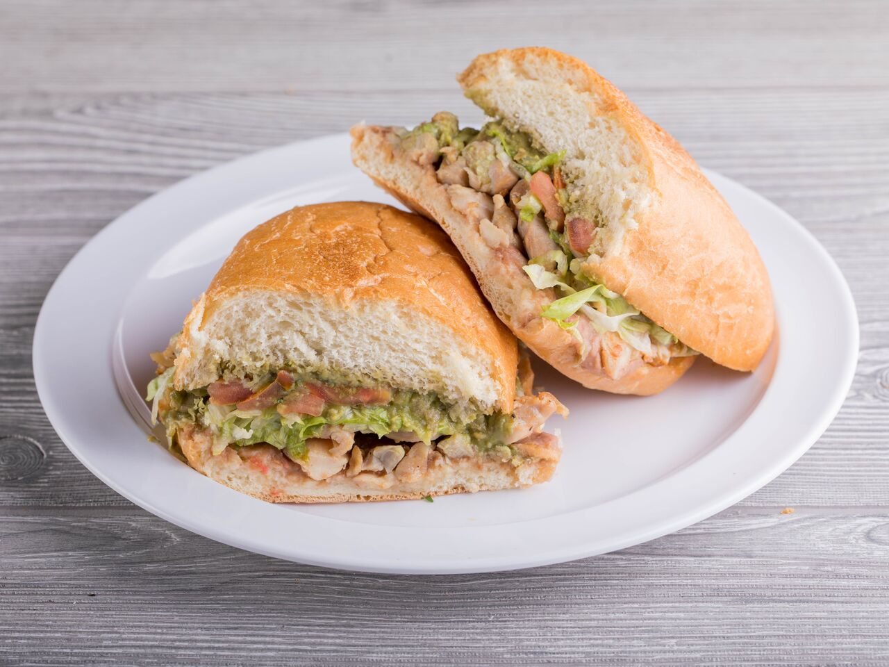 Order Chicken Torta food online from Ray Mexican Restaurant store, San Diego on bringmethat.com