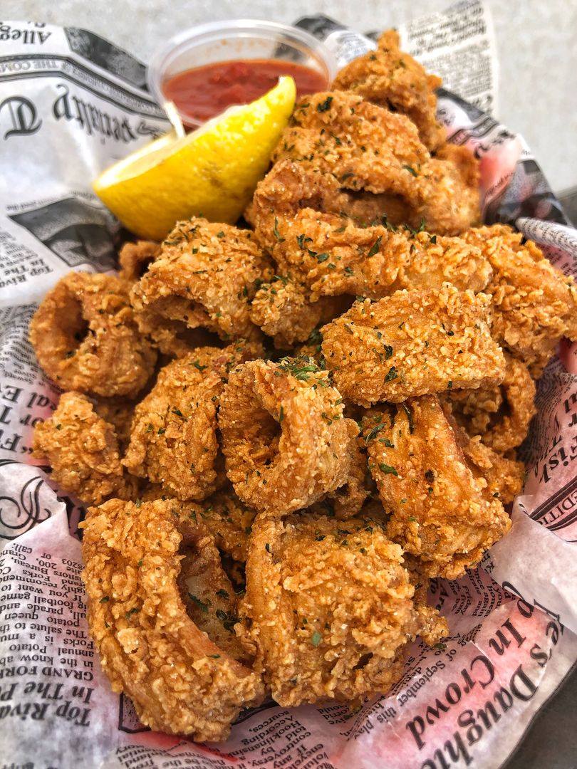 Order Fried Calamari food online from Hook & Reel Cajun Seafood store, West Valley City on bringmethat.com