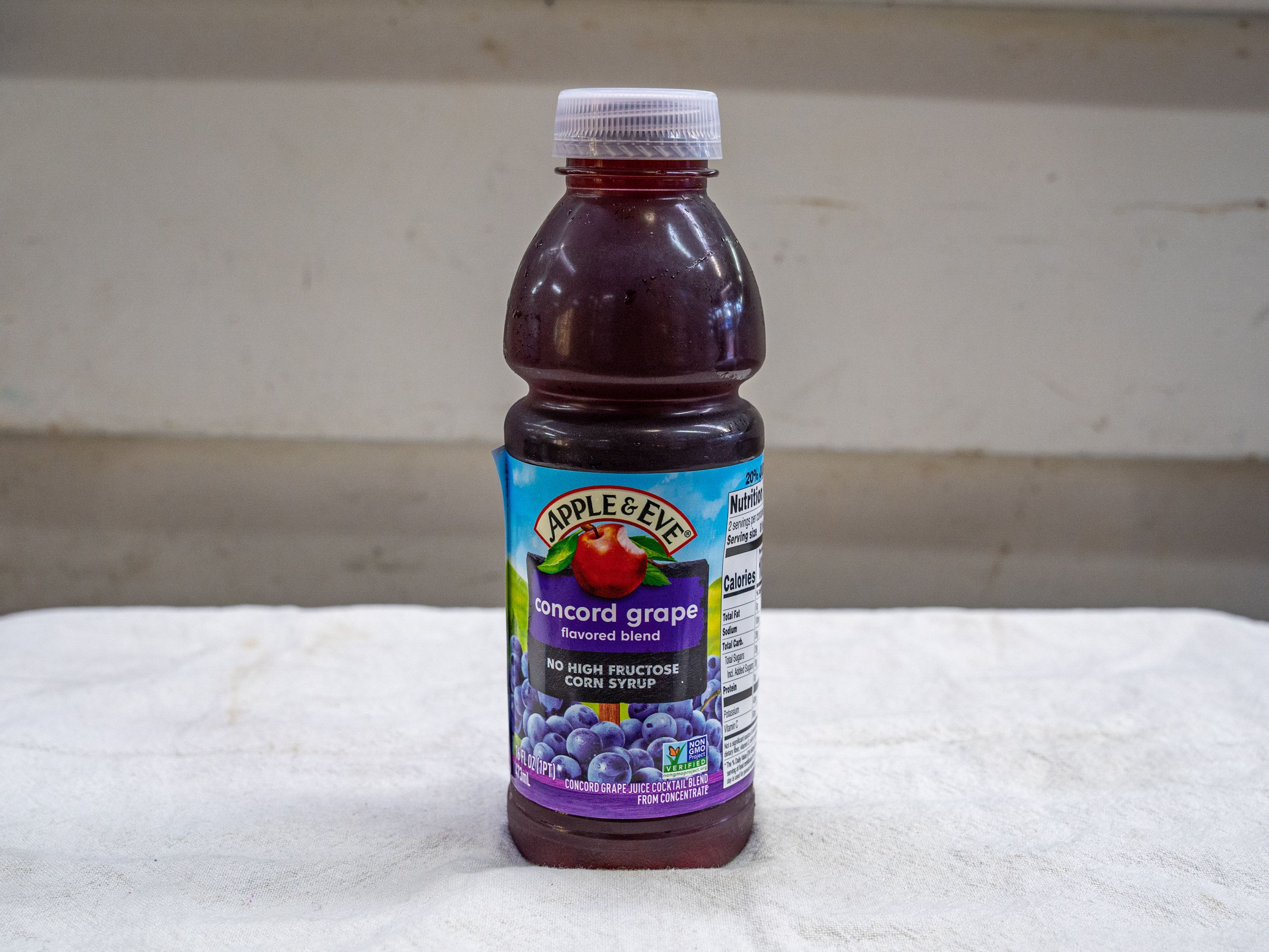 Order Apple & Eve Concord Grape -16oz food online from Quentin Deli and Grocery store, Brooklyn on bringmethat.com