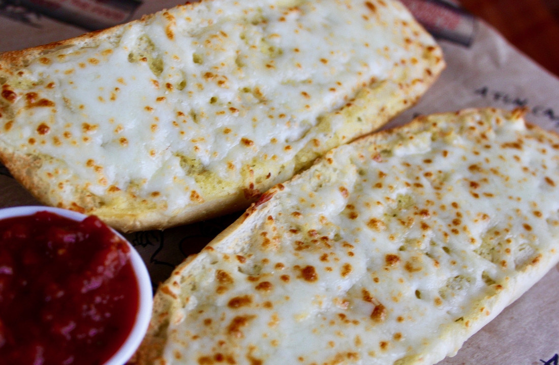 Order Cheesy Garlic Bread food online from Roosters store, Huntington on bringmethat.com