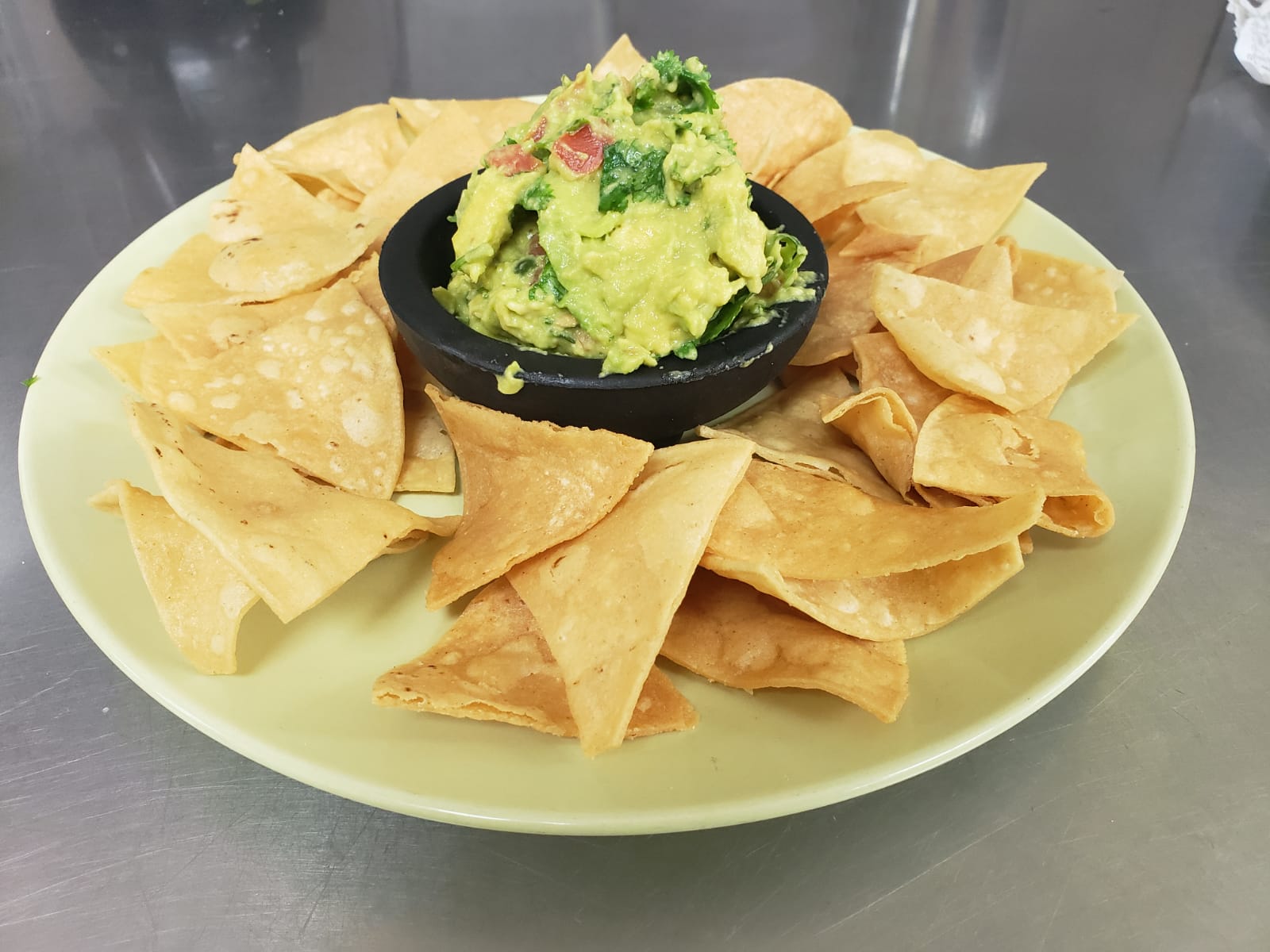Order Guacamole Dip food online from Aminas Cafe store, Bronx on bringmethat.com