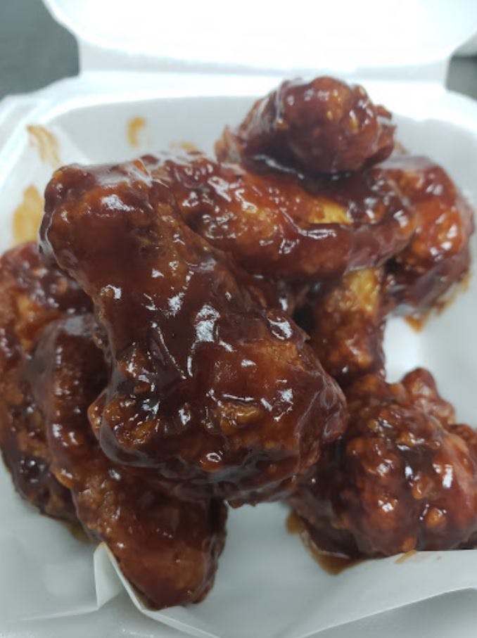 Order Wing Dings - 1 1/2 lb. food online from Zino's Subs Pizza & Catering store, Livonia on bringmethat.com