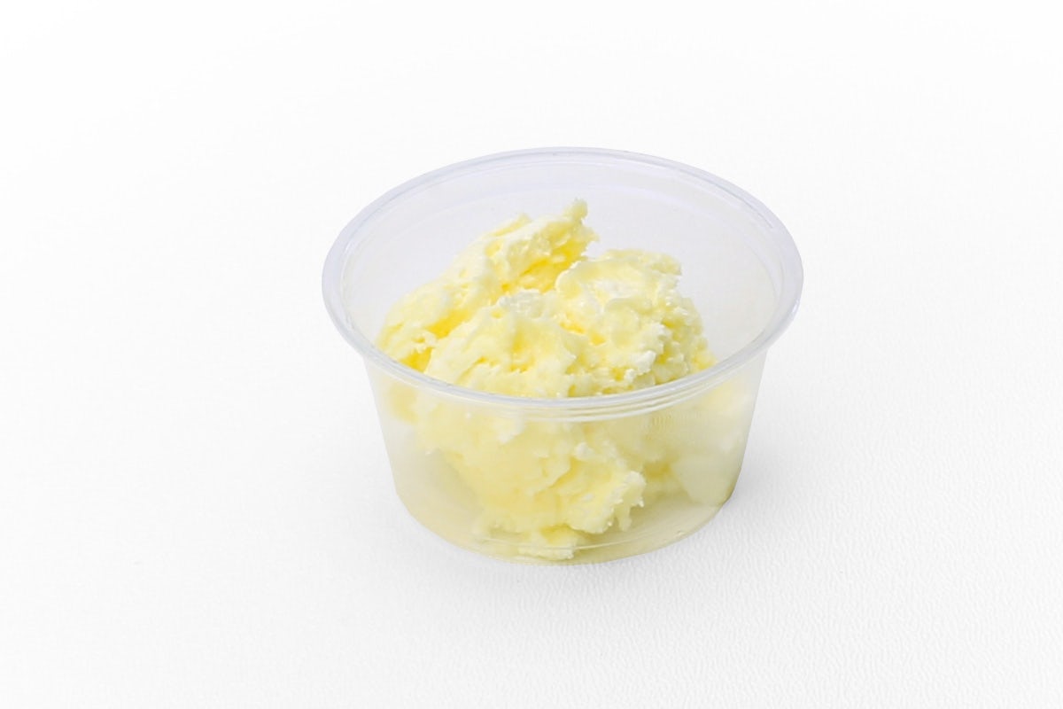 Order Side of Butter food online from Slim Chickens store, Helotes on bringmethat.com