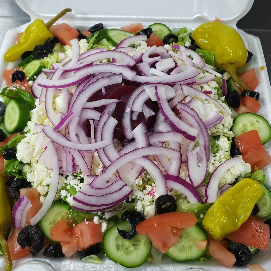 Order Greek Salad - Small (Serves 1-2) food online from Zino's Subs & Pizza store, Madison Heights on bringmethat.com