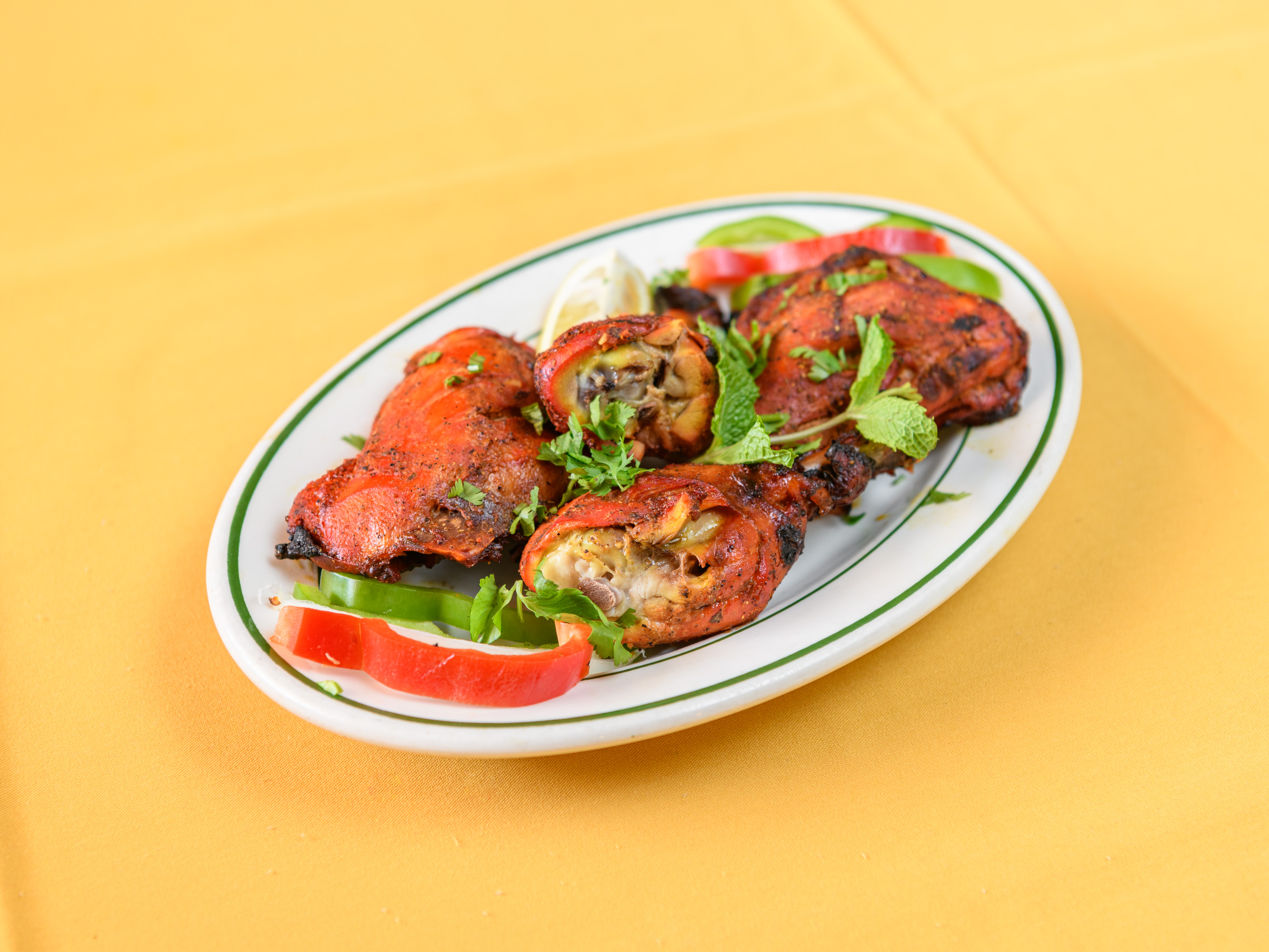 Order Tandoori Chicken (4 pieces) food online from Taj Cuisine of India store, Oklahoma City on bringmethat.com