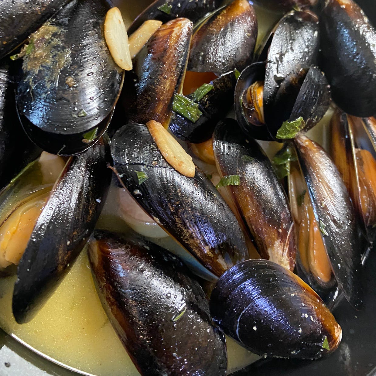 Order Steamed Mussels* - Steamed Mussels* food online from La Familia store, Katonah on bringmethat.com