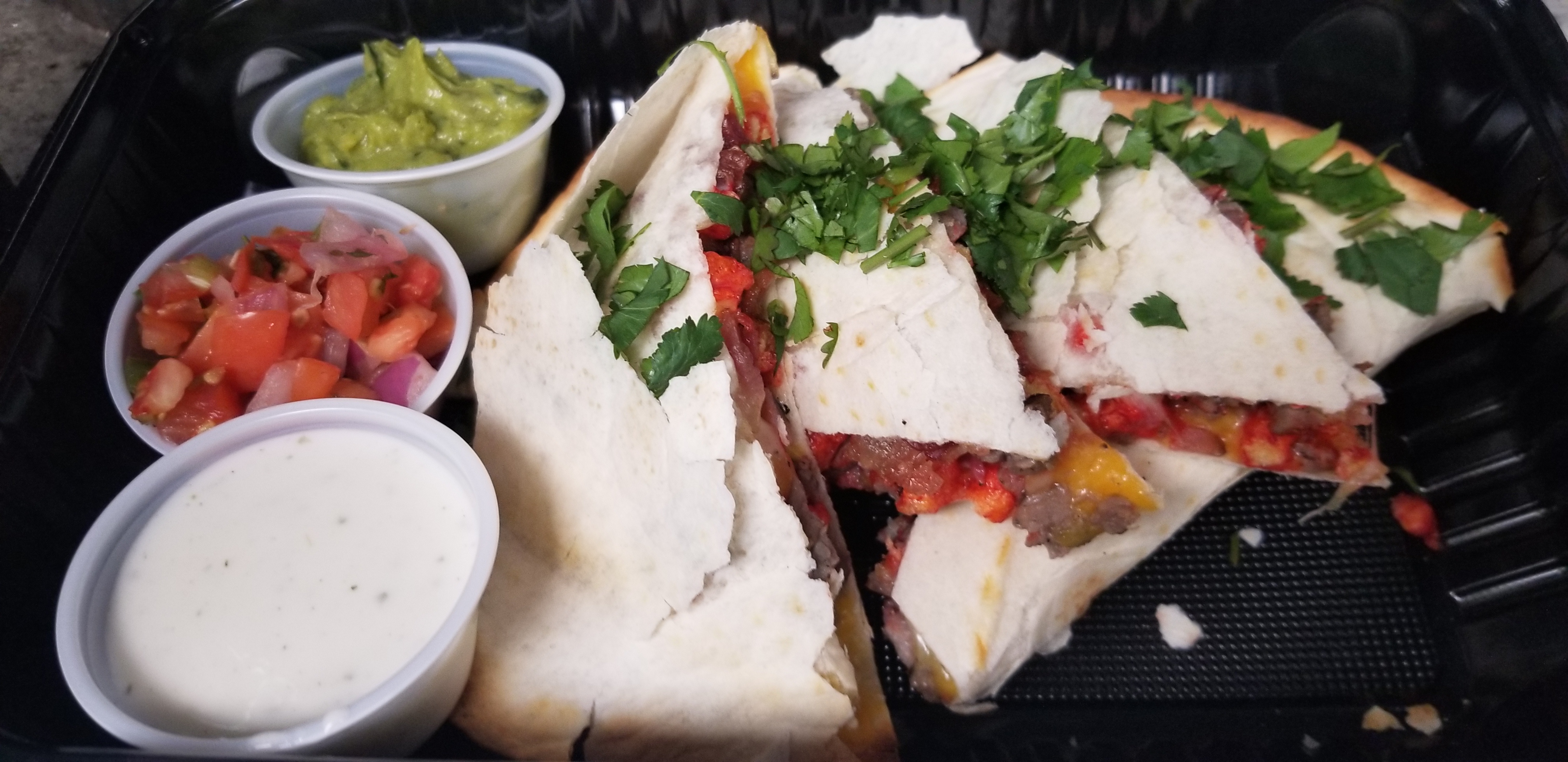 Order Loaded Quesadilla  food online from The Eco Cafe store, Oak Park on bringmethat.com