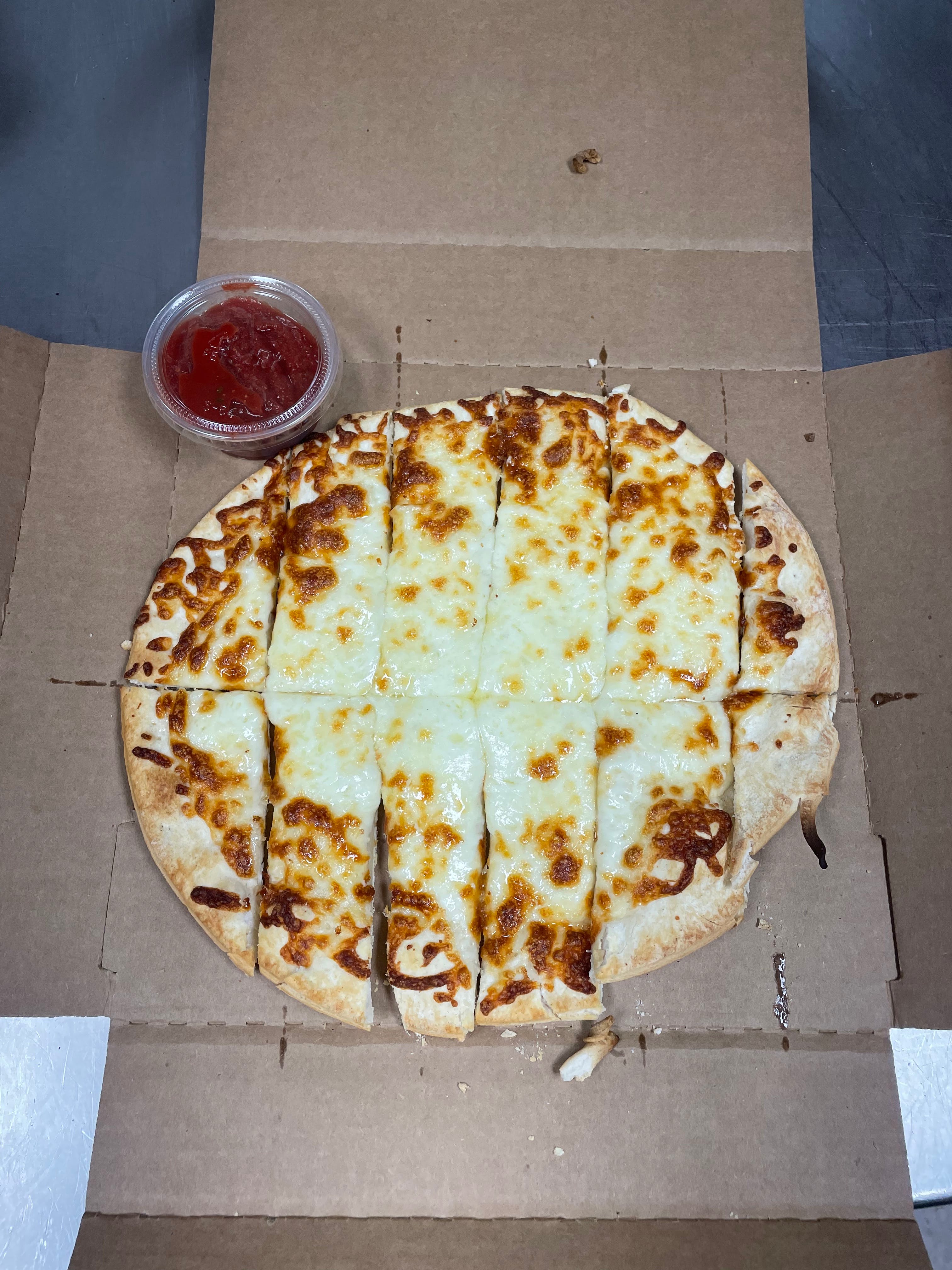 Order Cheese Bread - Small 10" food online from Pizza Man store, Ellsworth on bringmethat.com