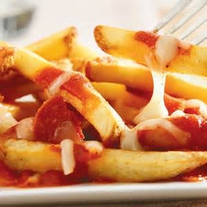 Order Pizza Fries food online from Freddy Wings & Wraps store, Newark on bringmethat.com